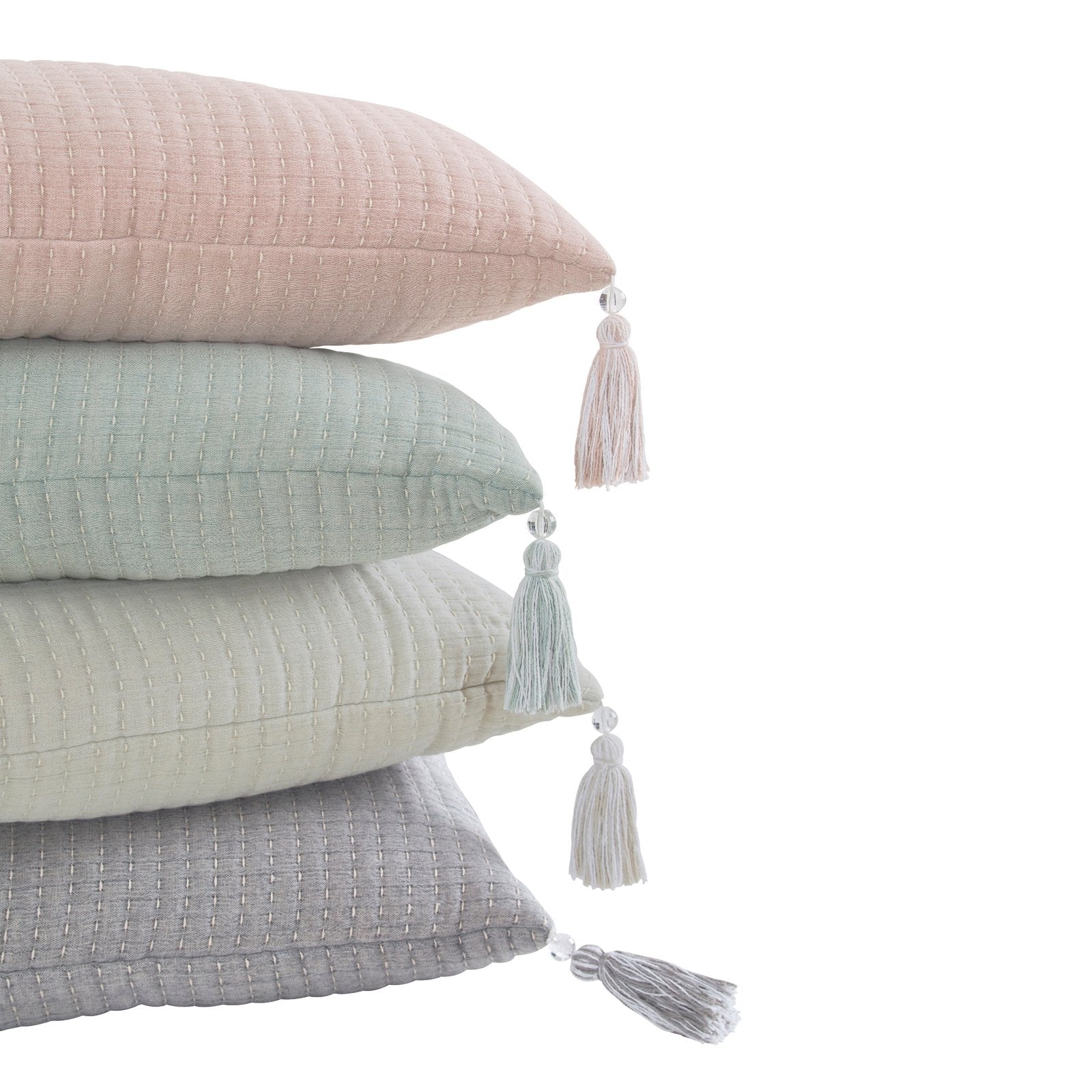 TP-105-X_1|Stacked pastel decorative pillows: pink, mint, cream, and gray with elegant tassels, adding textured charm to any room.