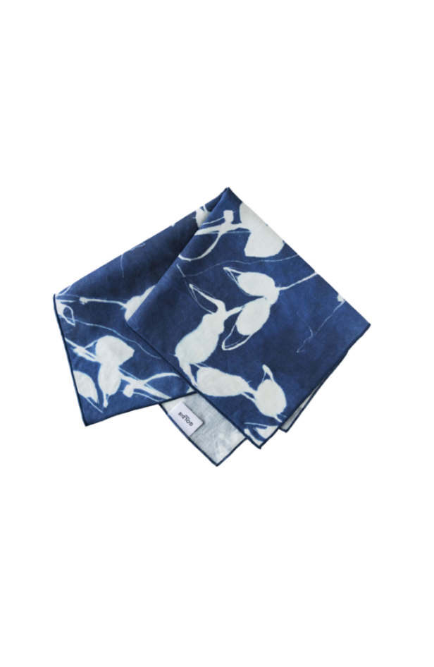 Porto Print Indigo linen dinner napkin set of 4 styled on dining table - Goldie Home