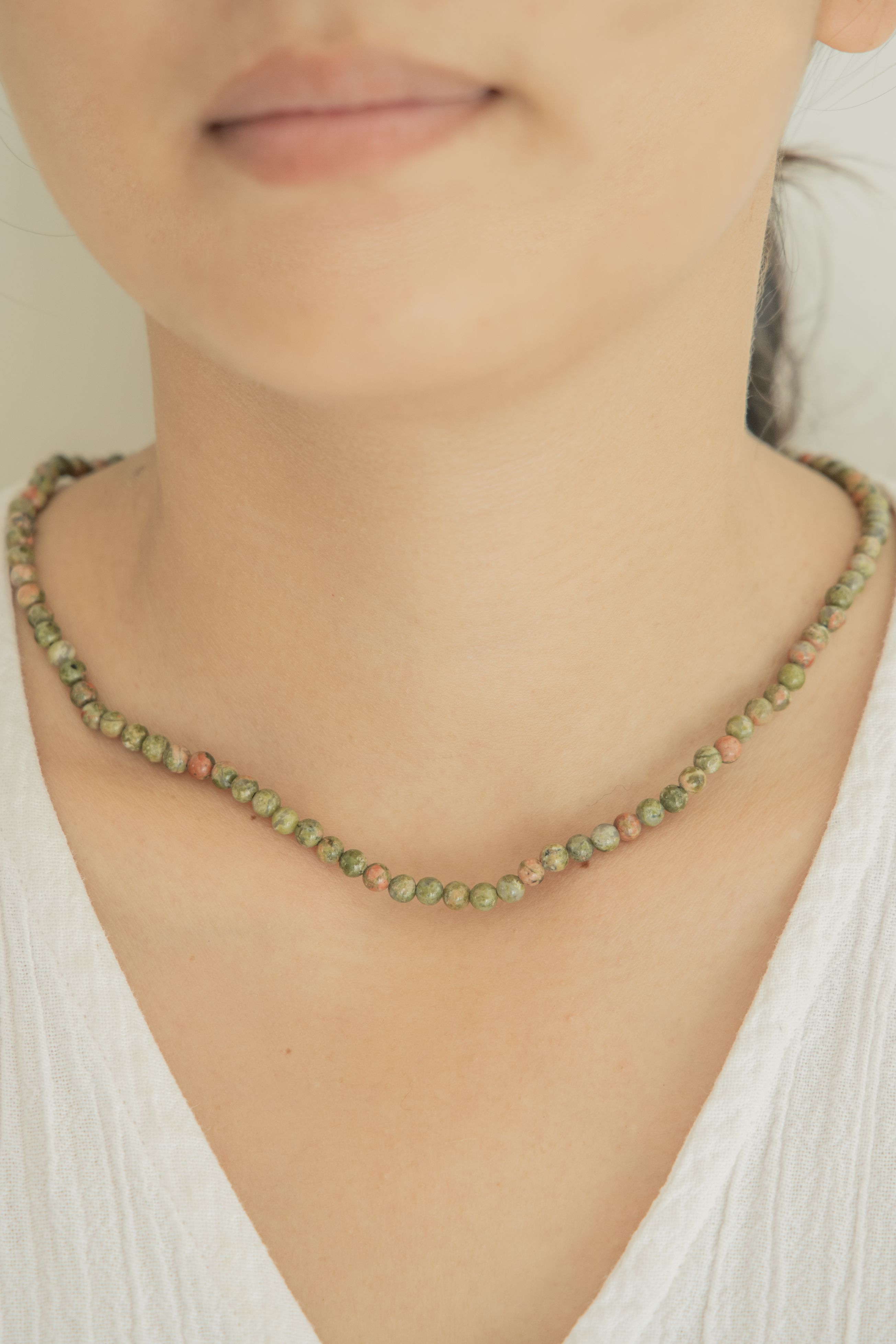 Gemstone & Gold Necklace handmade by Village Thrive using natural materials.