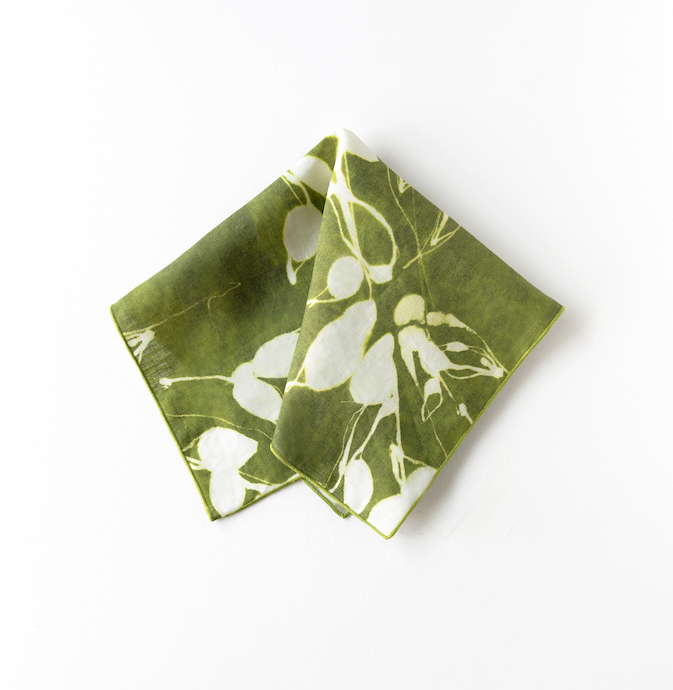 Porto Print Olive linen dinner napkin with hand-painted cascading floral pattern in earthy olive green - Goldie Home