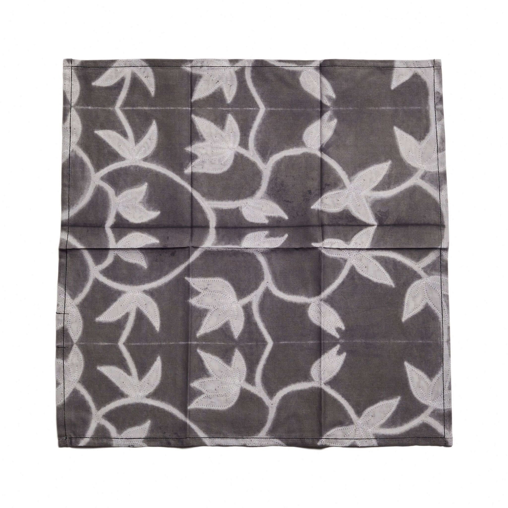 Folio Black Handcrafted Shibori Print Cotton Table Napkins ( set of 4 ) showcasing elegant floral patterns.
