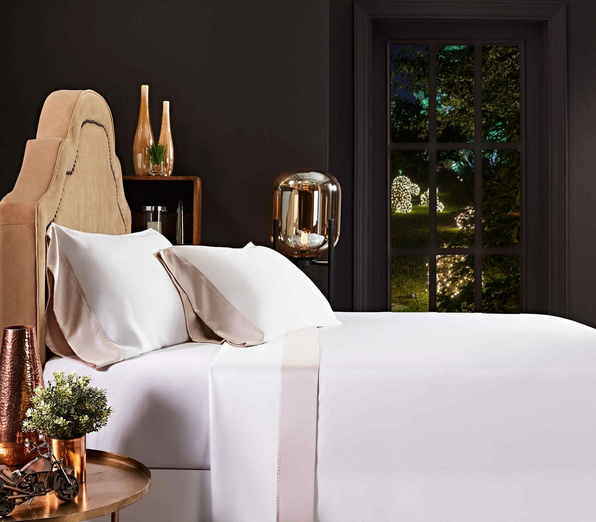 KSS-512-7880_5|White 100% Lyocell sheets with a refined beige trim on a bed, offering silky, breathable, and sustainable comfort.