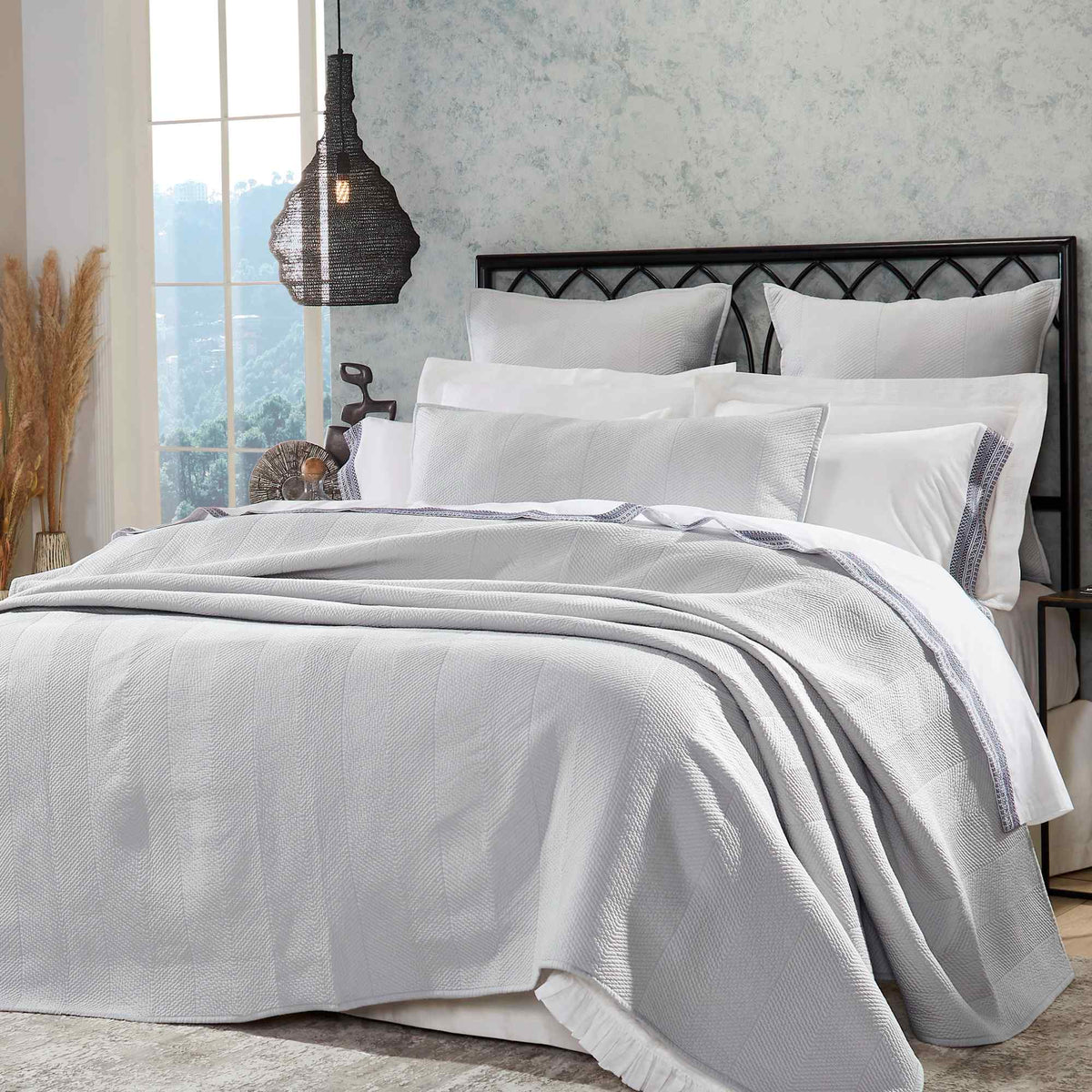 CL-172-9496_2|Contemporary light grey quilted coverlet with a herringbone pattern, creating an inviting and comfortable bedroom look.