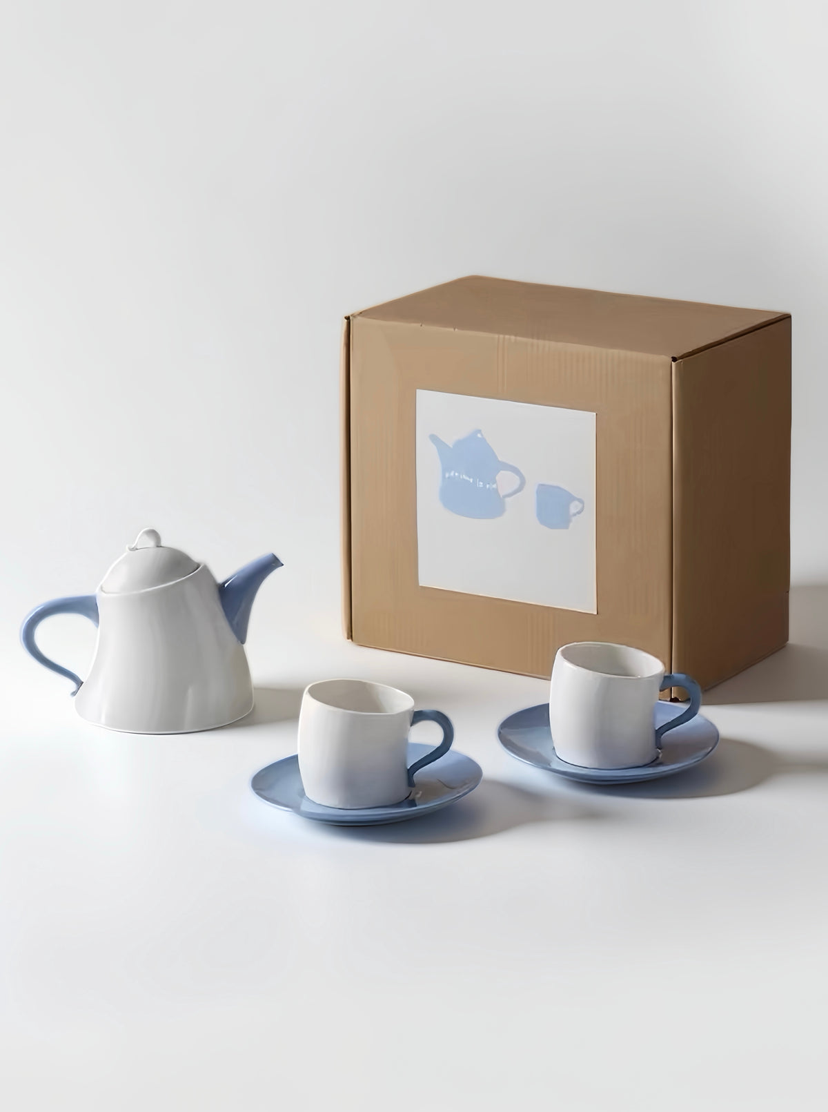 Whimsical Wiggle Handle Ceramic Tea Set with Teapot and Mugs