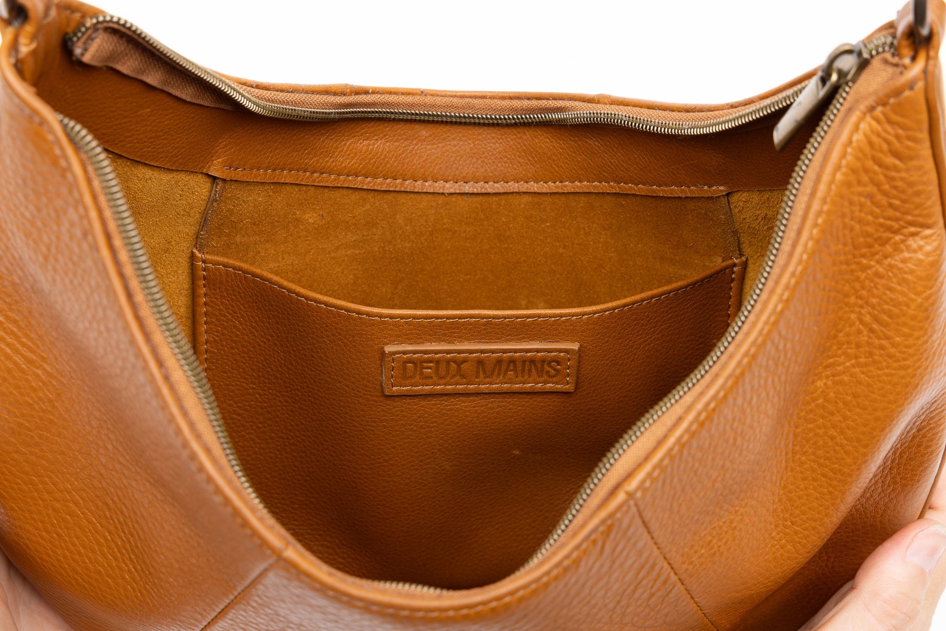 saddle shoulder bag from womens bags in honey fall showcasing exterior view.