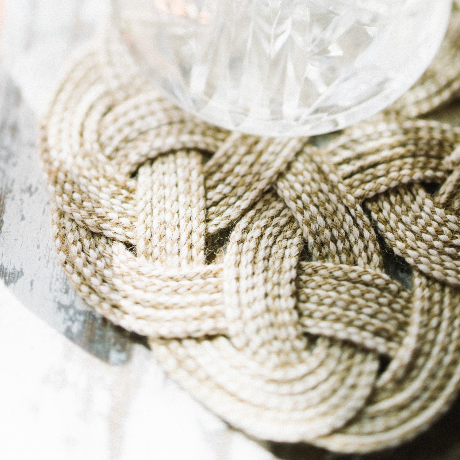 Detailed photo of quality home decor, hand knit coaster, beautiful coasters for home