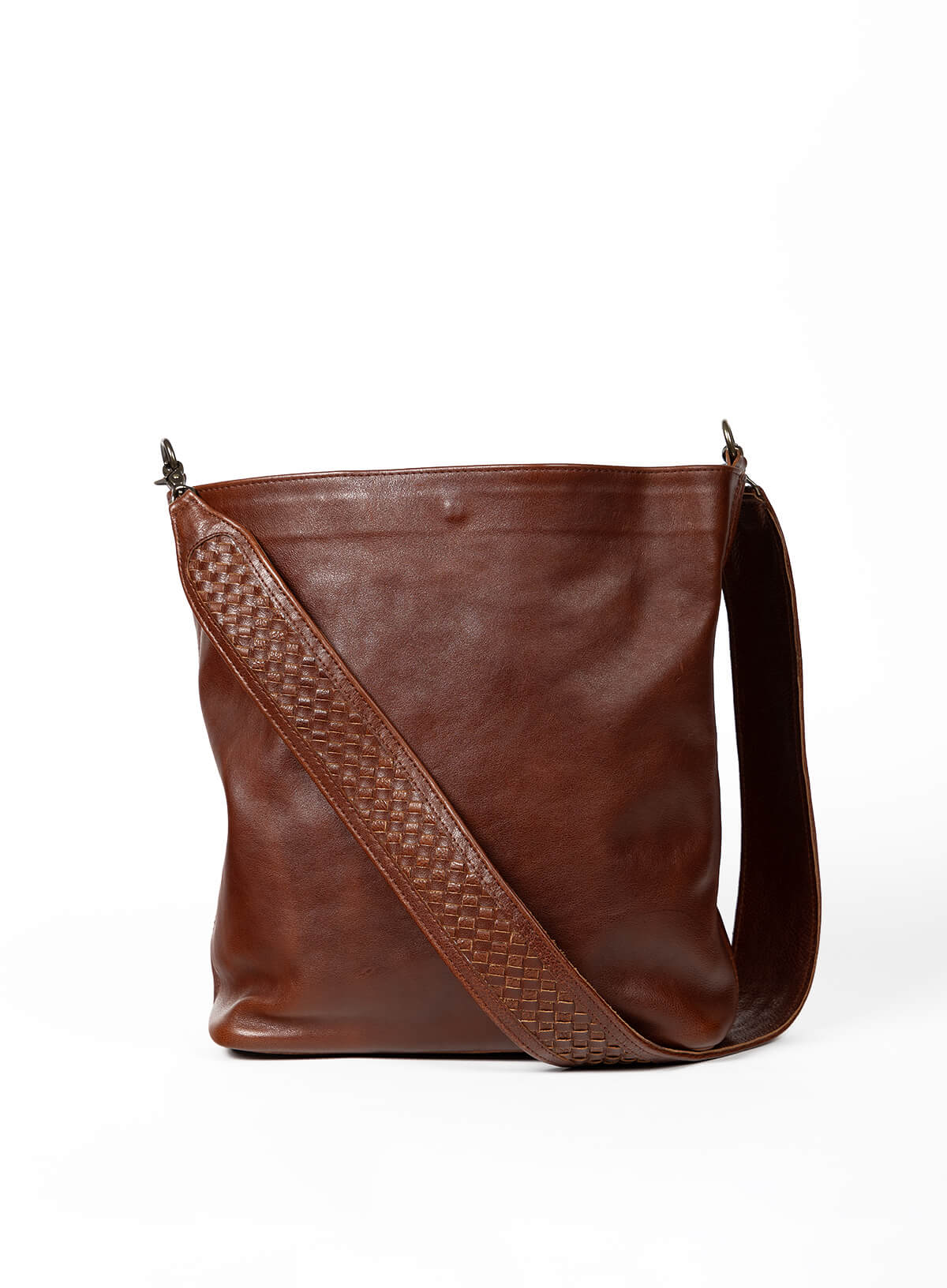 sarah shoulder bag in black and mahogany held by models standing.