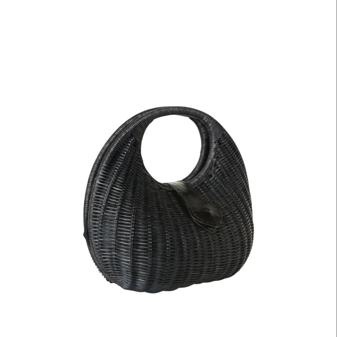 Shop Sarah Stewart Matilda black wicker handbag with leather trim and single handle. A stylish summer accessory.