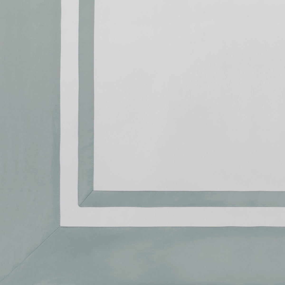 AKP-541-2040_5|Close-up of a white 100% cotton sateen flat sheet with a wide light blue border and a thinner white inner border.