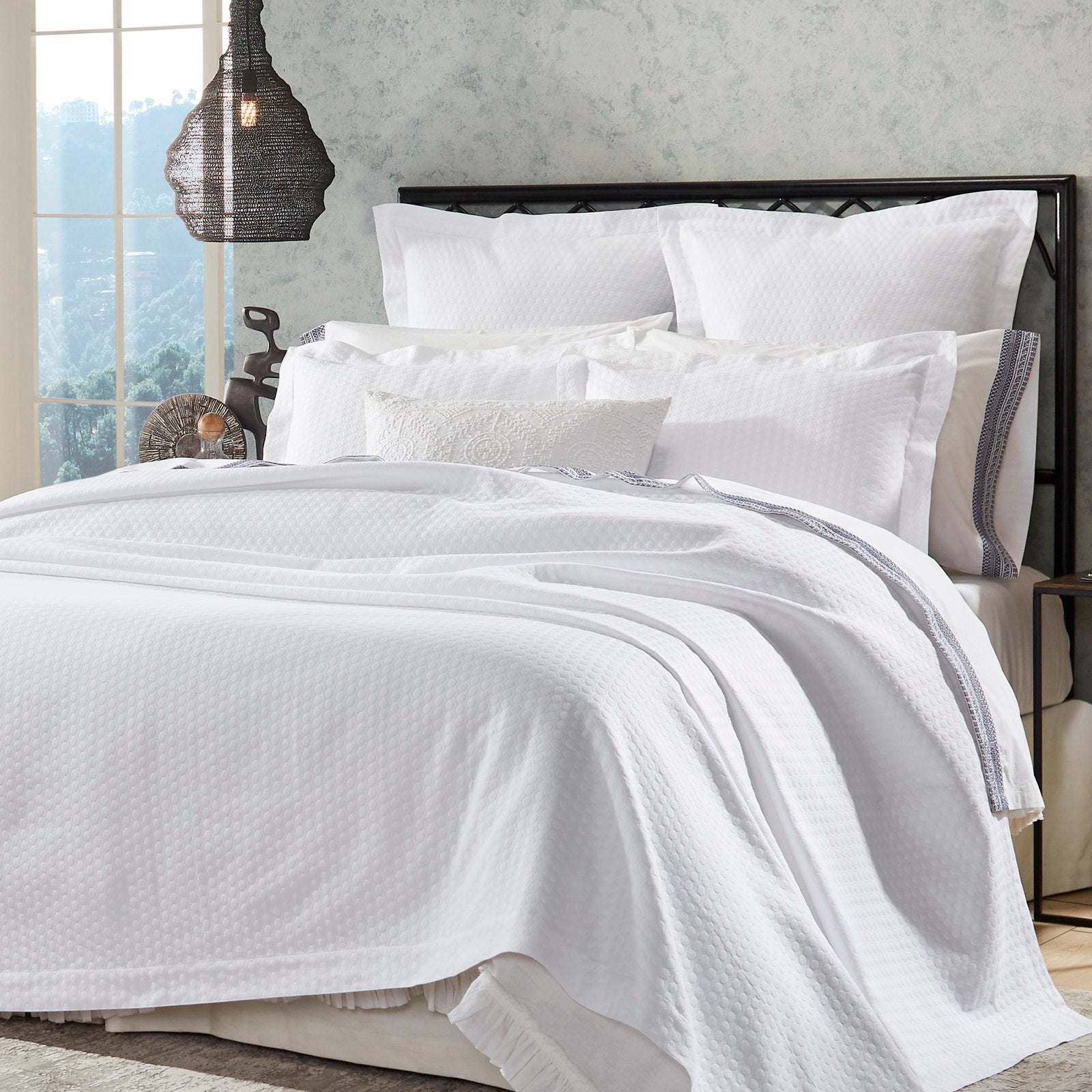 CL-174-11096_4|Elegant white coverlet featuring a distinctive textured bubble pattern, perfect for a cozy bedroom ambiance.