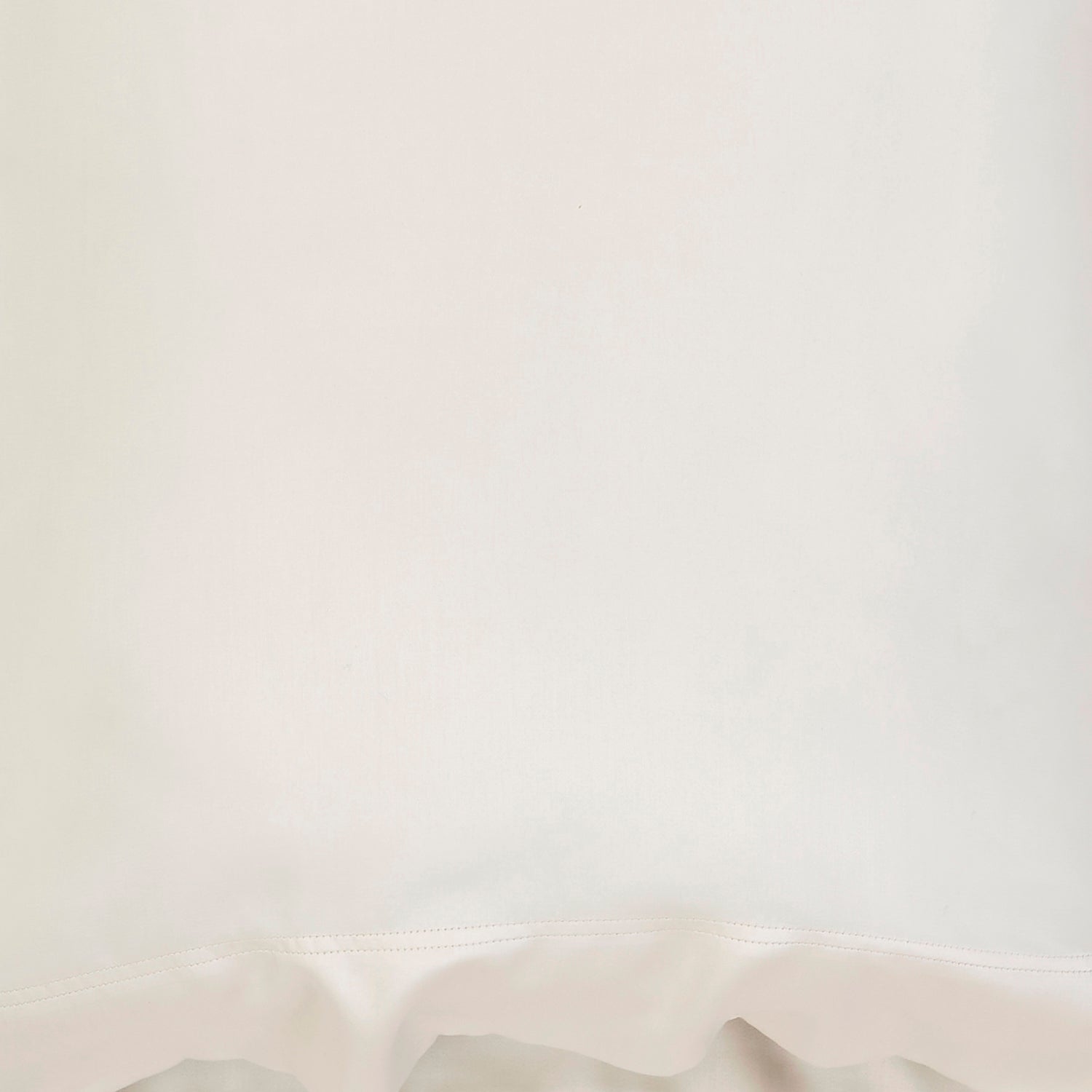 ASP-510-2032_3|Off-white 100% Lyocell sheets fabric close-up, showcasing its gentle texture and natural, luxurious sheen.