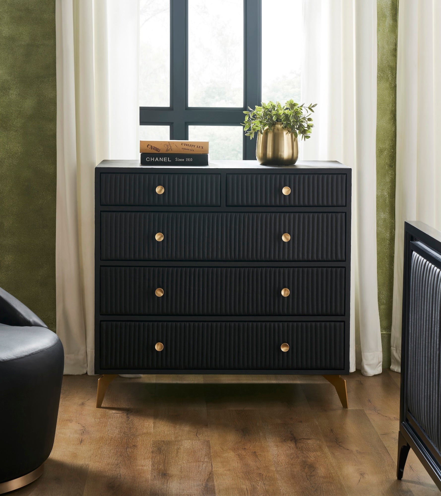 FN-5217-482036_6|Modern black leather chest of drawers with elegant fluted design, sleek gold hardware, and sturdy golden legs, perfect for luxury bedroom furniture.