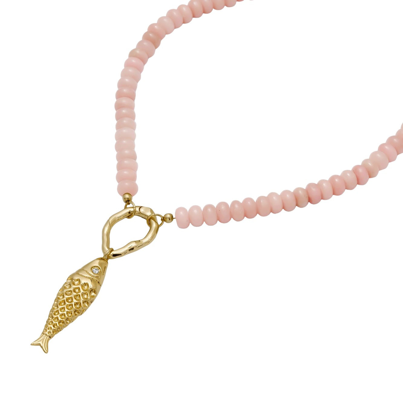 Pink opal beaded necklace with gold fish charm and gold carabiner clasp on a white clasp. Hand beaded by Katie Dean Jewelry.
