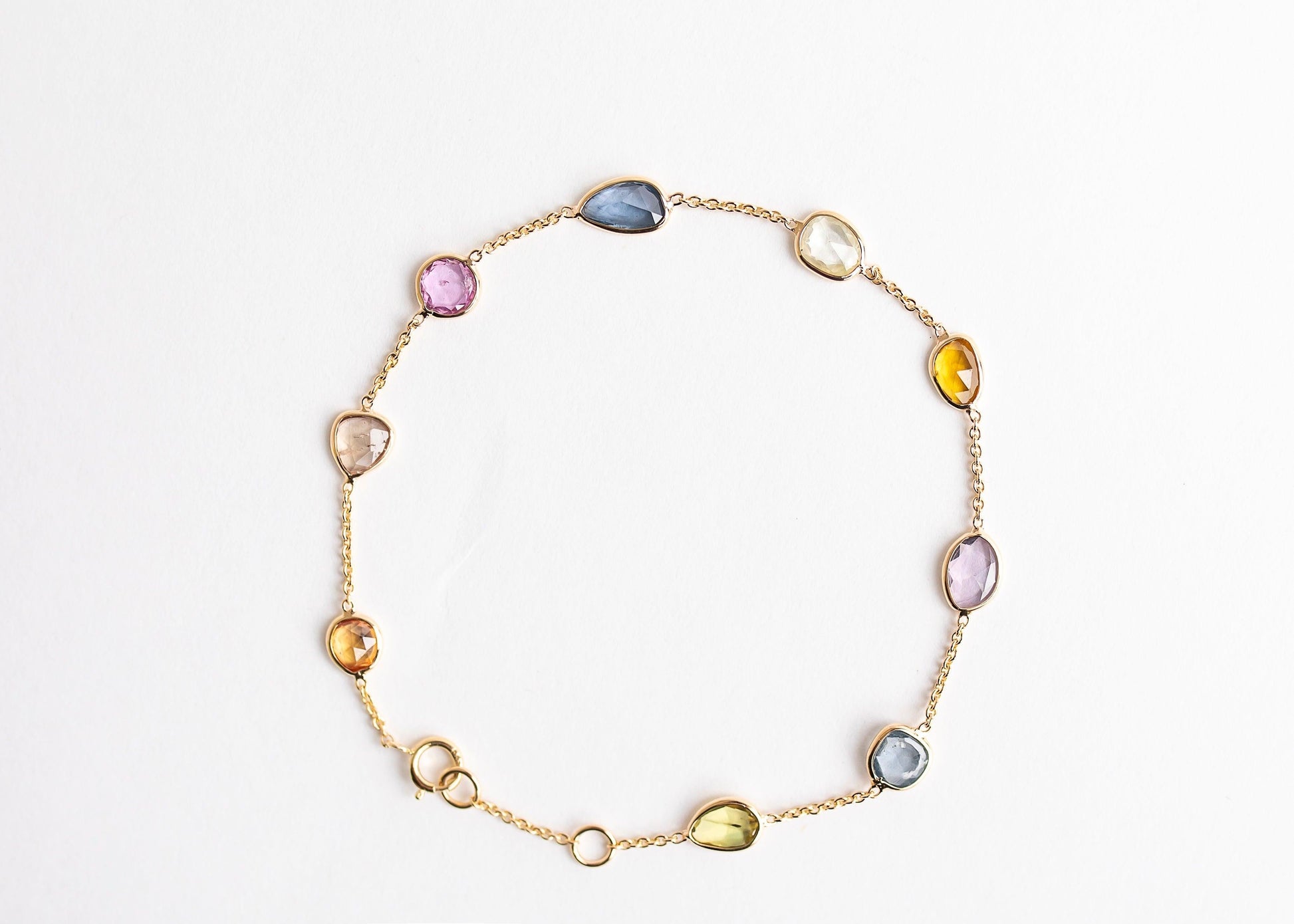 Rainbow Radiance minimal everyday fine jewelry in solid gold and sterling 925 silver with natural gemstones.