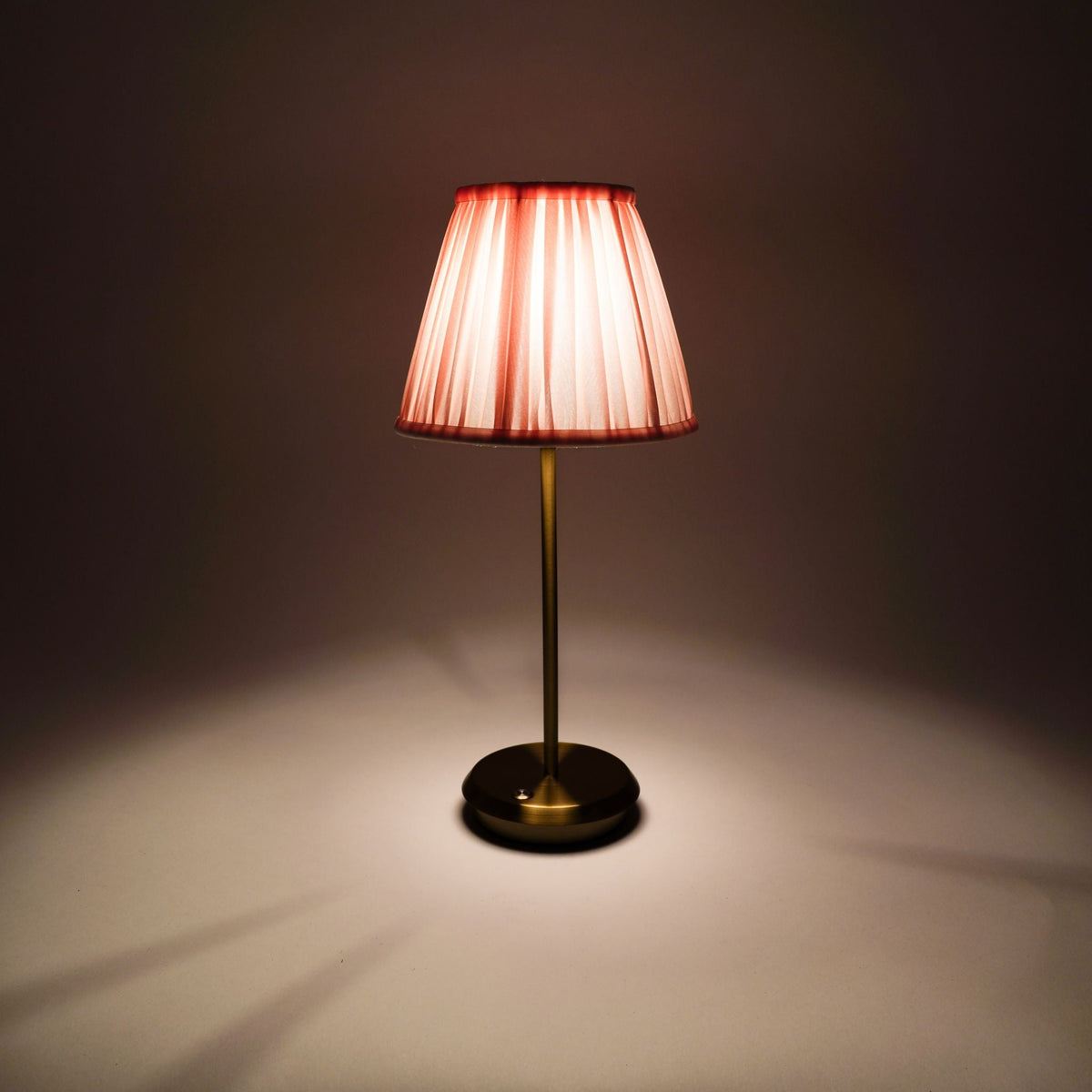 Blush Velvet cordless table lamp illuminated