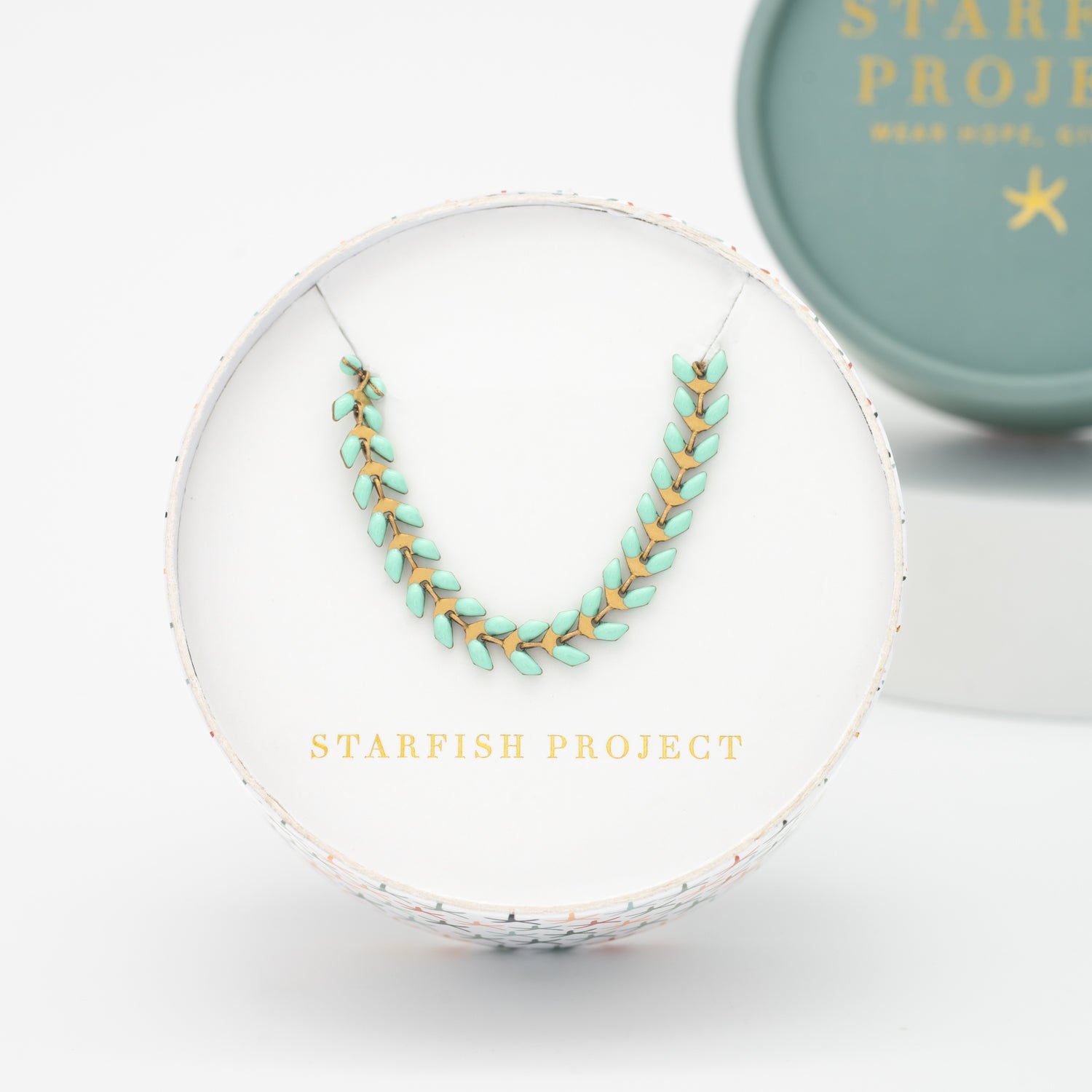 14k gold and green necklace, seed-shaped necklace, Starfish Project, jewelry brands, necklaces like pandora 