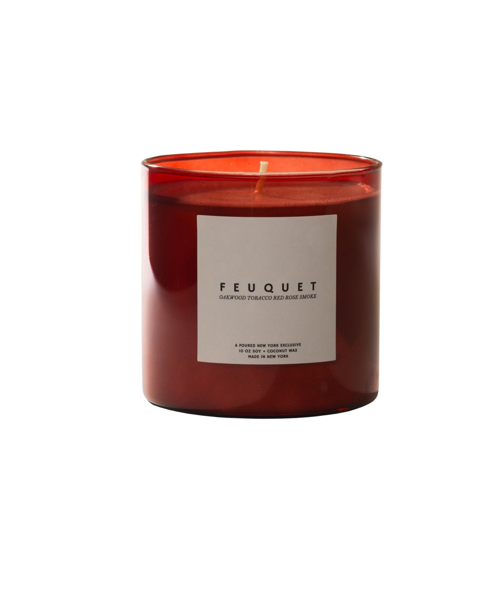 Poured New York ' Feuquet' red candle with matching red box with a flame decal on a neutral background