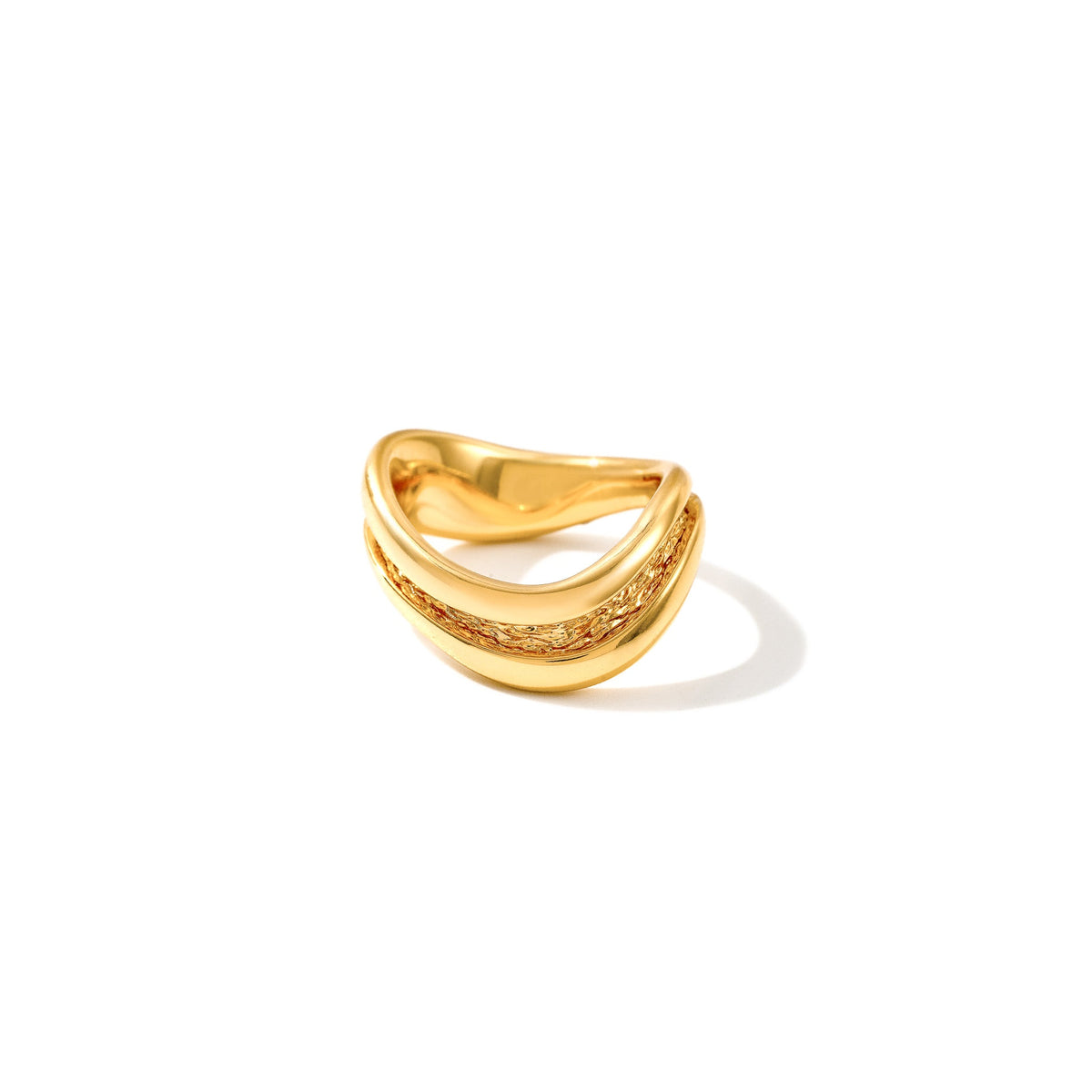 Thin gold stacking ring with a smooth outer surface and textured inner channel, Laminar Currents collection