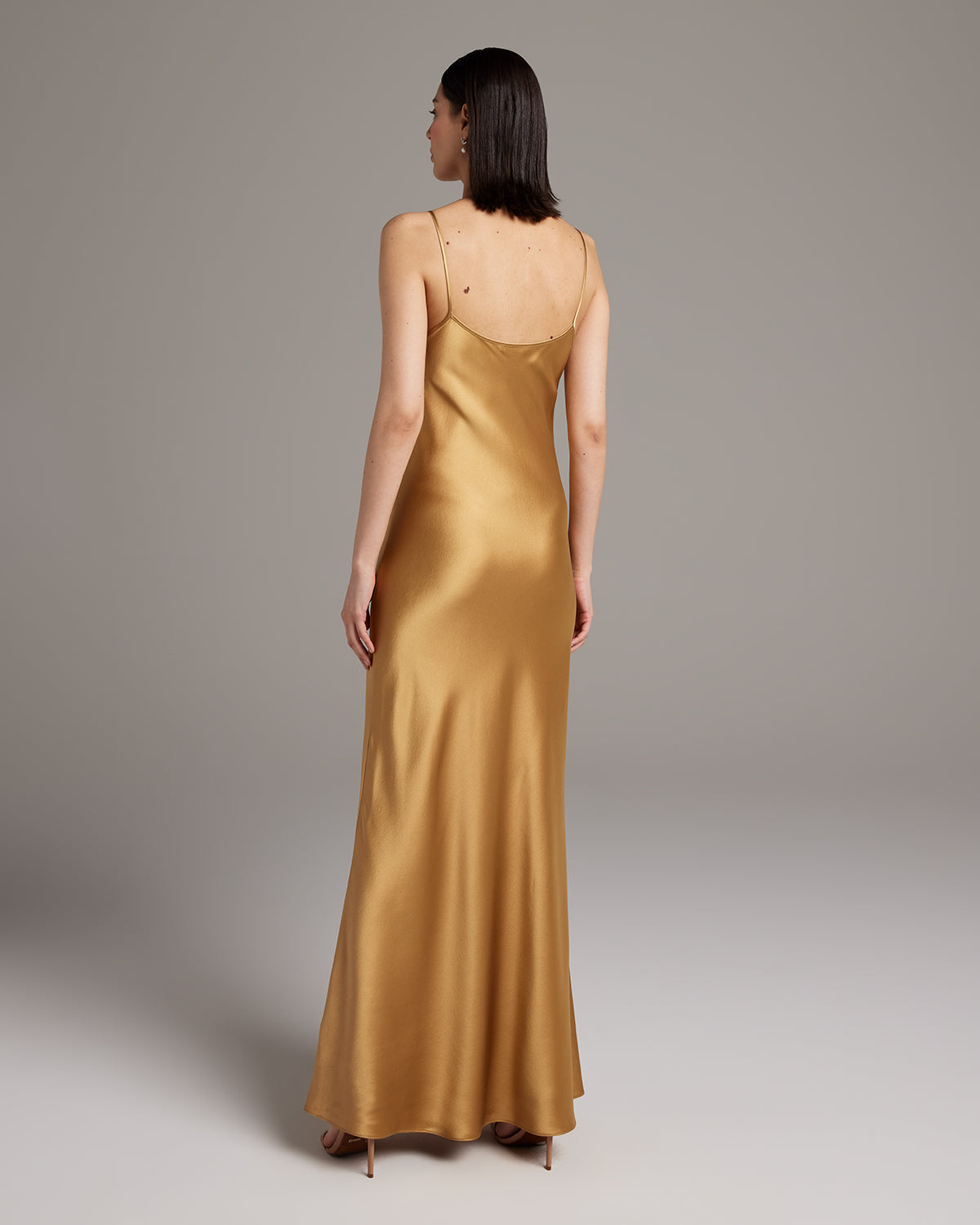 Back view of a gold Liquid Silk Slipdress