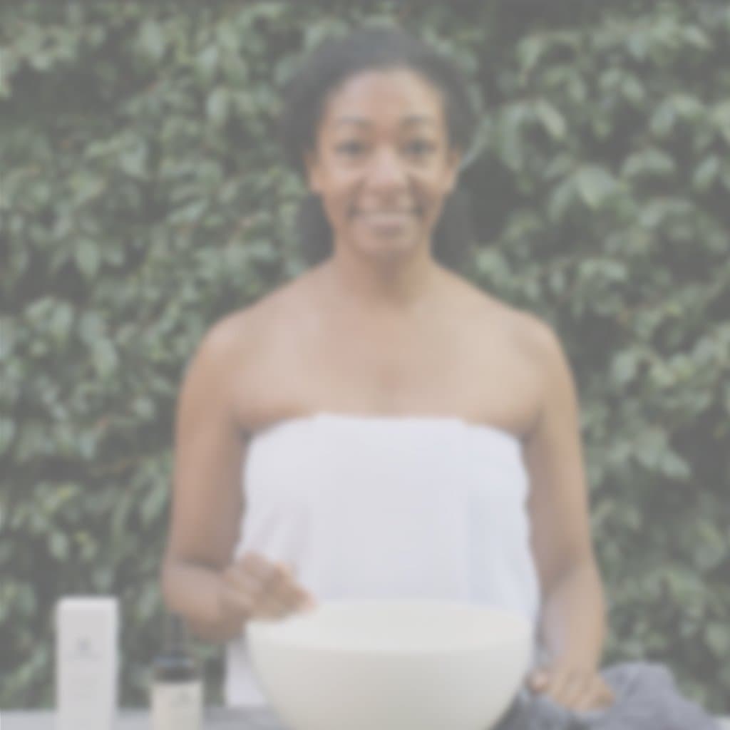 Video of a model wrapped in a towel showing how to apply the Aloe Herb Cleanser to her face, and to wipe with a clean wet wash cloth. 
