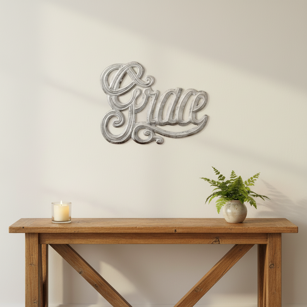 Effortless Grace Haitian nativity metal art displayed on a home wall above a rustic console table - SM099