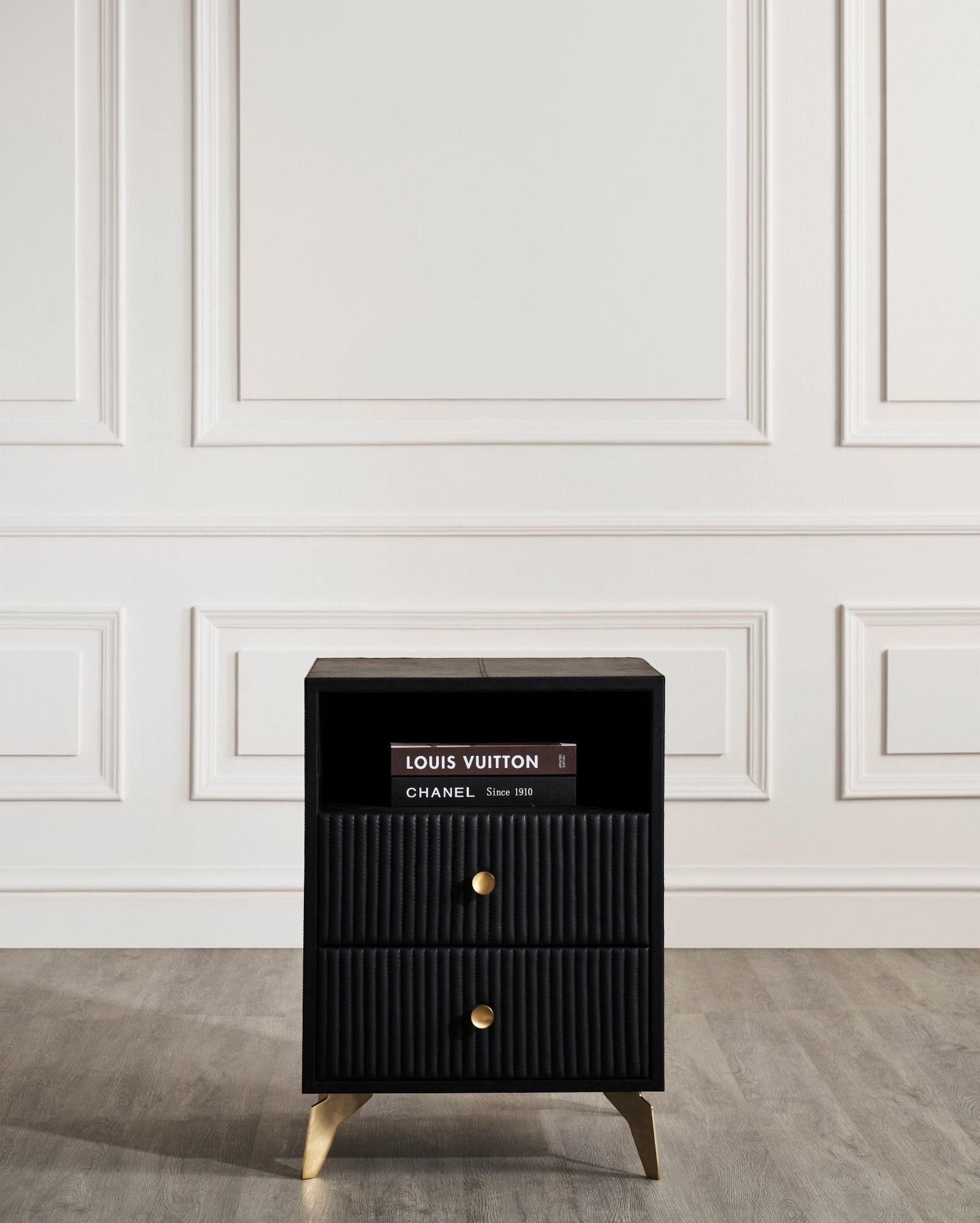 FN-5202-201828_3|Sophisticated black genuine leather nightstand with two fluted drawers, open shelf, and gold-finished legs, essential bedroom furniture.