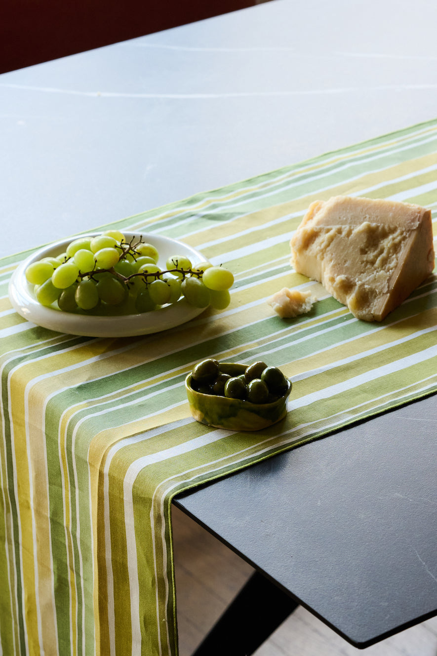 Lagos Stripe linen table runner flat lay close up of bold hand-painted stripe detail - Goldie Home