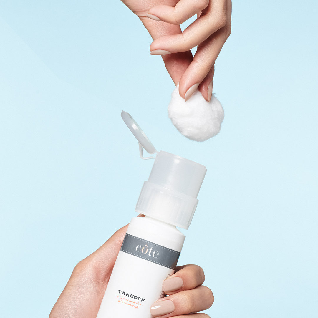 Open bottle of Côte Beauty Takeoff Non-Acetone Nail Polish Remover Gentle Non-Toxic Formula. 
