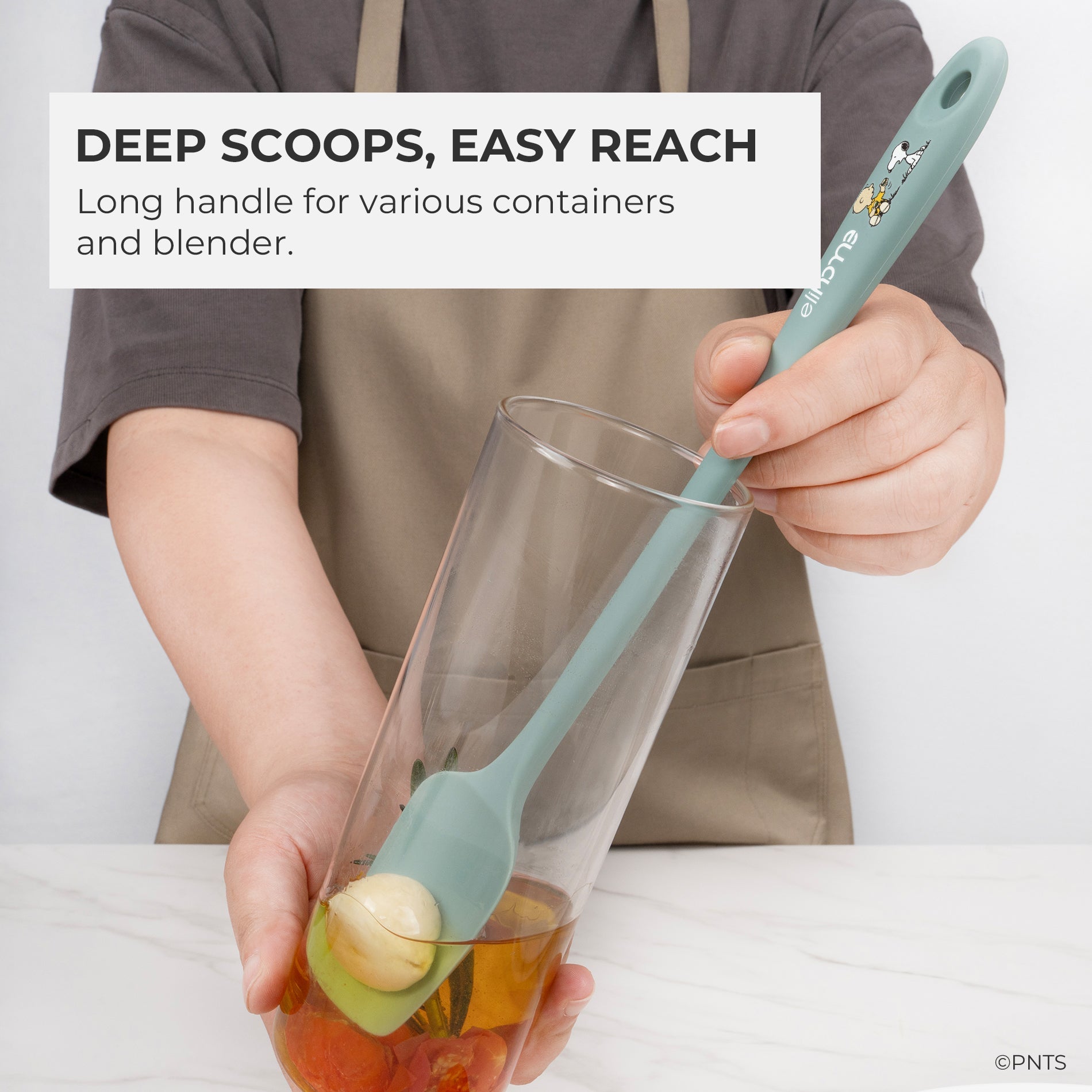 Person using a long-handled spoon to scoop from a container with text about deep scoops and easy reach.