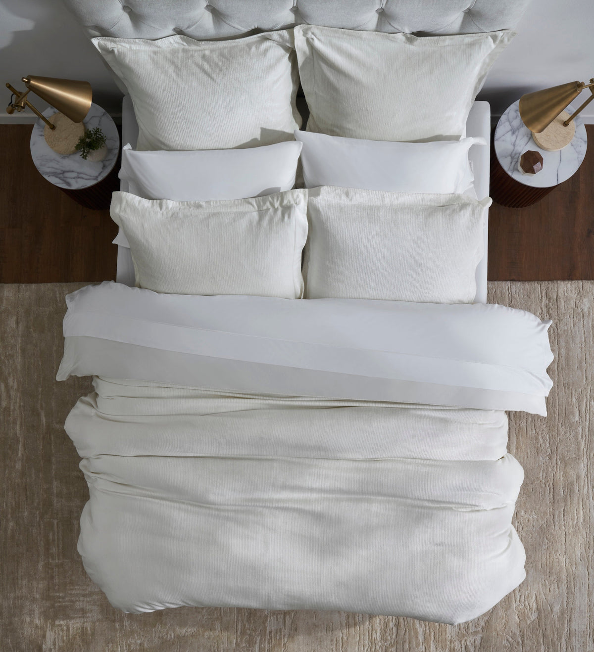 DT-052-9092_4|Pristine white textured duvet cover with a subtle ribbed pattern, neatly arranged on a bed, offering supreme comfort.