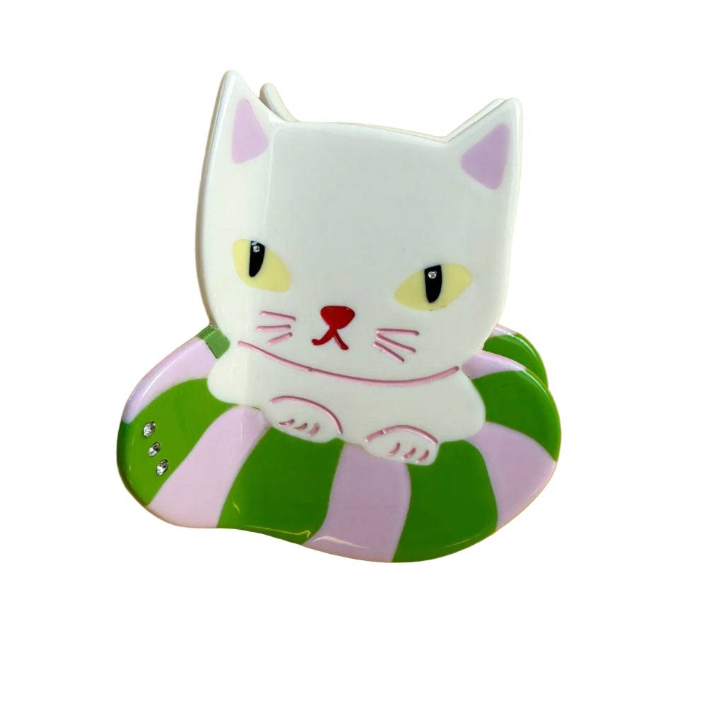 This Kitty is an hedonist, he just vacations, he goes from Jeju Island to Oaxaca beaches to swim in his trendy and cool donut floaty. Have lots of fun this summer with our Vacation Kitty Hair Claw.