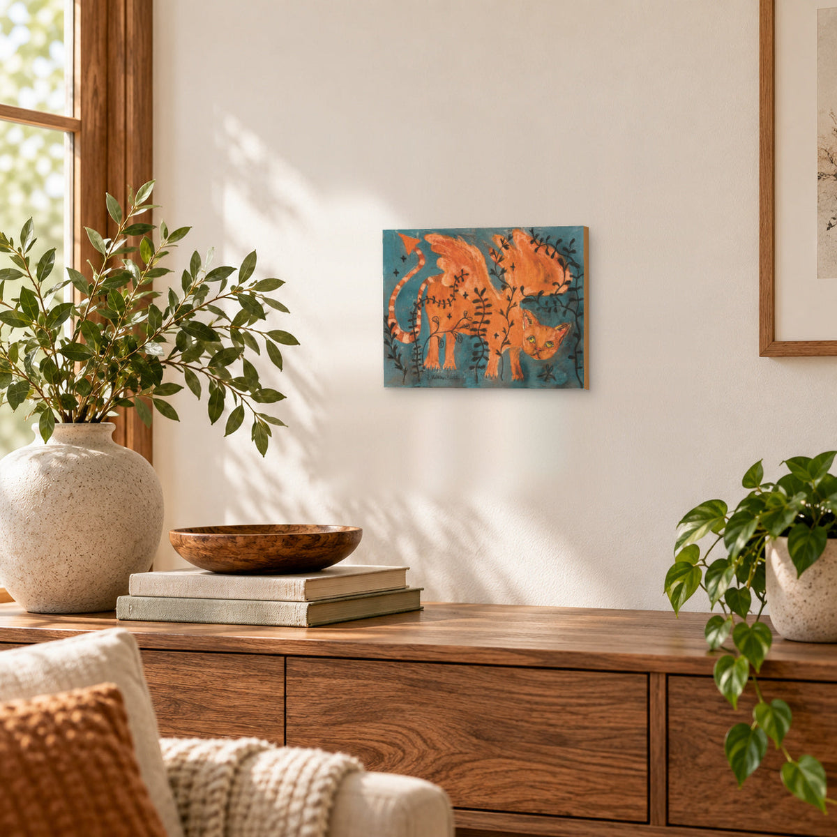 Dragonfly Cat winged orange cat art print, styled on a wall in a room