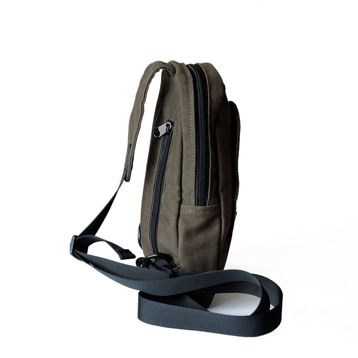 Buru green small canvas sling bag flat lay #color_green