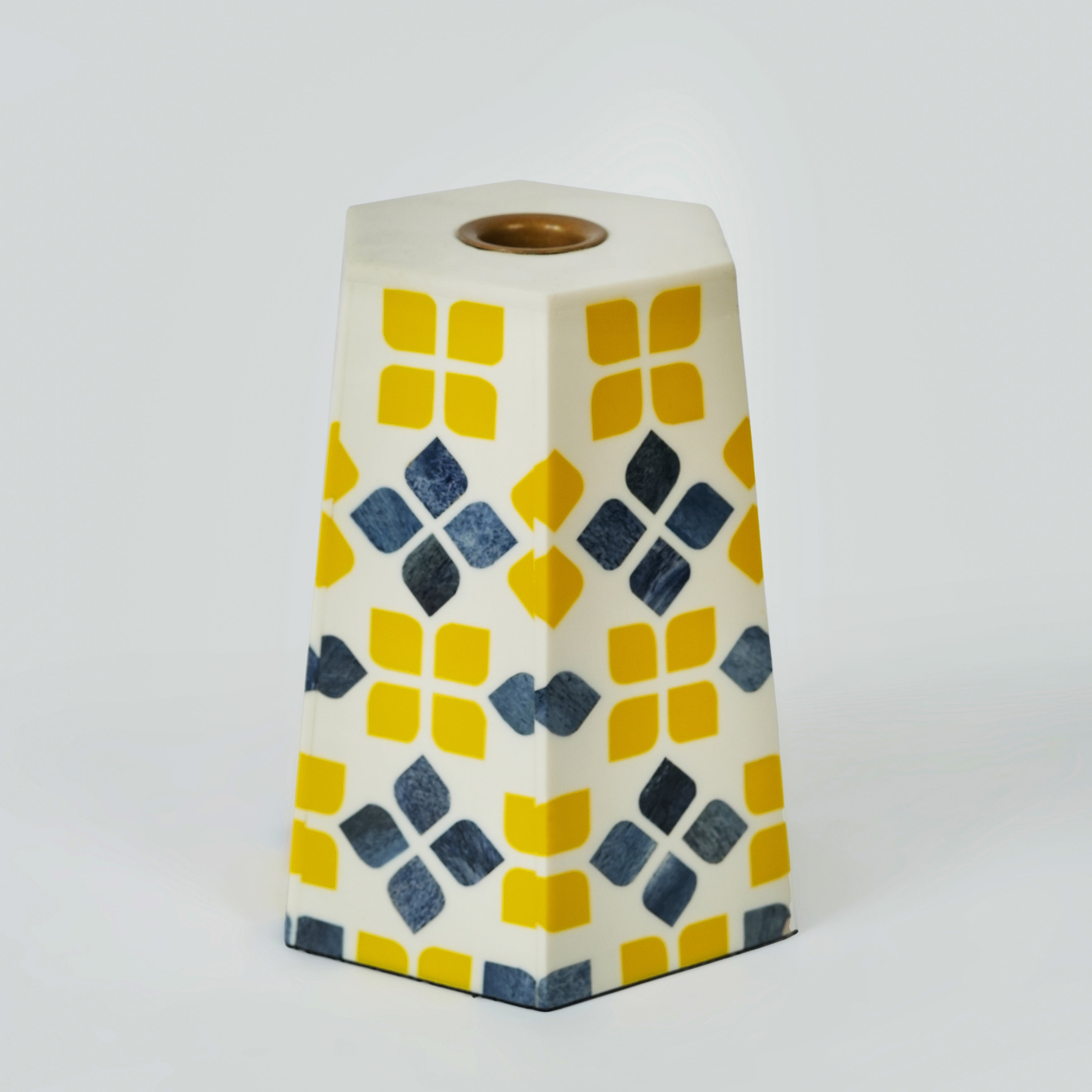 Handcrafted Marigold Mosaic bone inlay candleholder featuring a yellow floral pattern on a white background.
