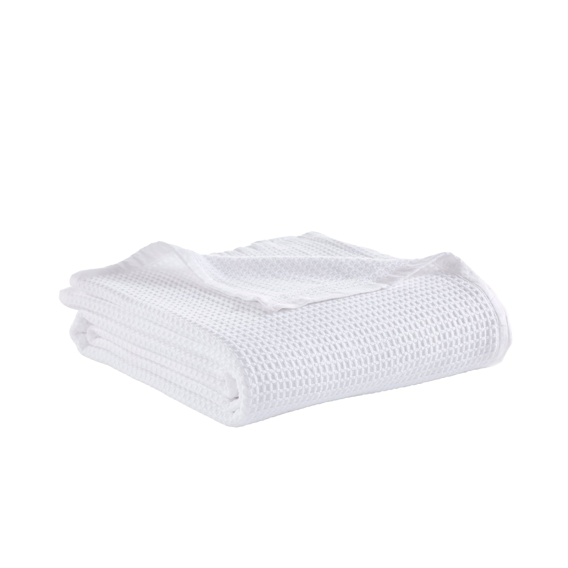 BL-855-11096_3|Perfectly folded white waffle weave blanket, ideal for adding a touch of classic comfort and texture to any room.