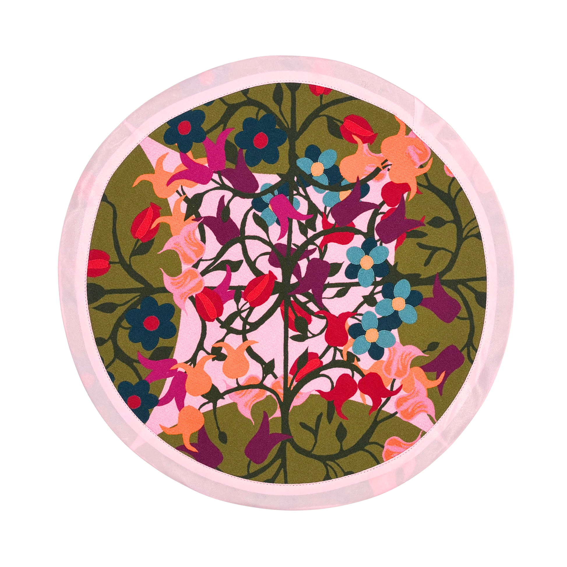 Round placemat with green and pink floral geometric print in organic cotton.