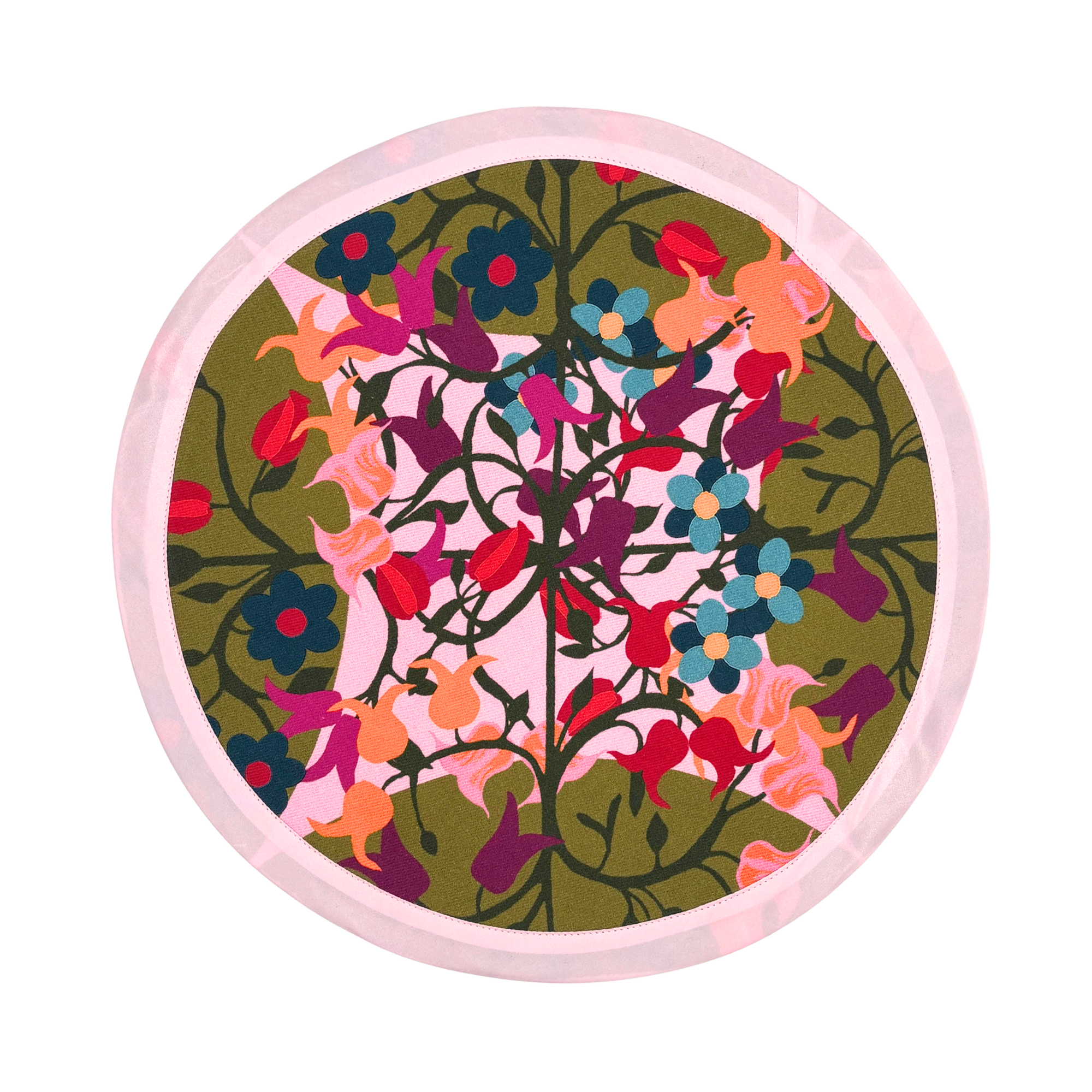 Round placemat with green and pink floral geometric print in organic cotton.