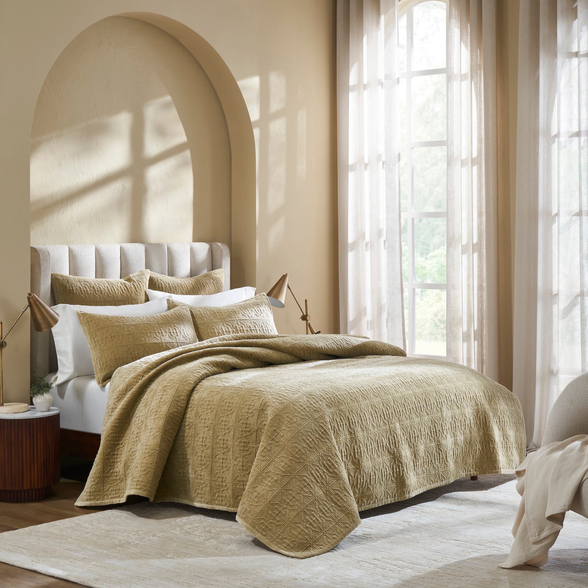 QT-377-9496_2|Elegant tan quilted bedspread with a geometric pattern, draped over a bed with white sheets and pillows, enhancing cozy bedroom decor.