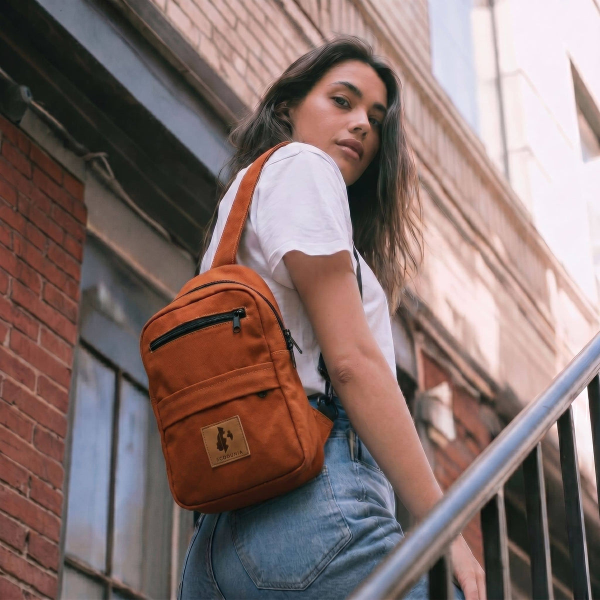 Umoja rust canvas outdoor crossbody sling bag #color_rust