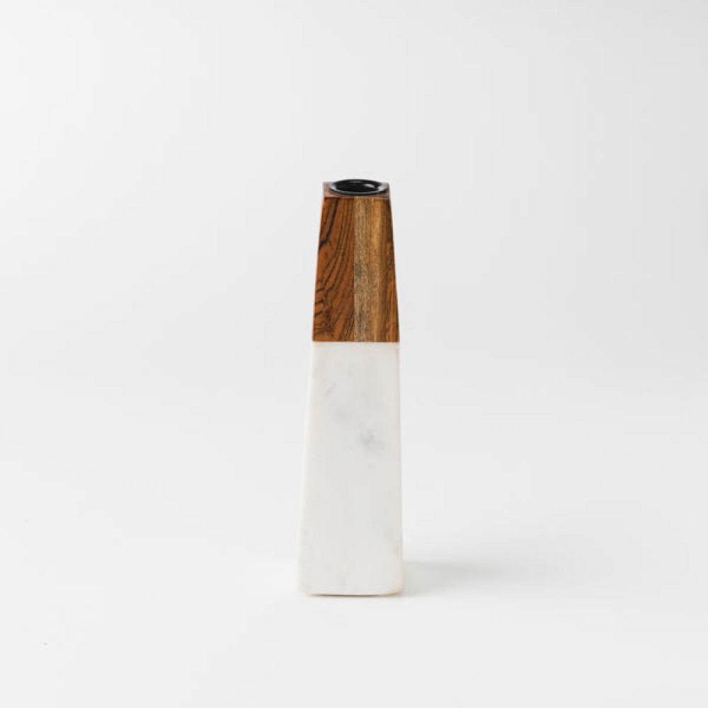 white marble candleholder styled on table with candle

