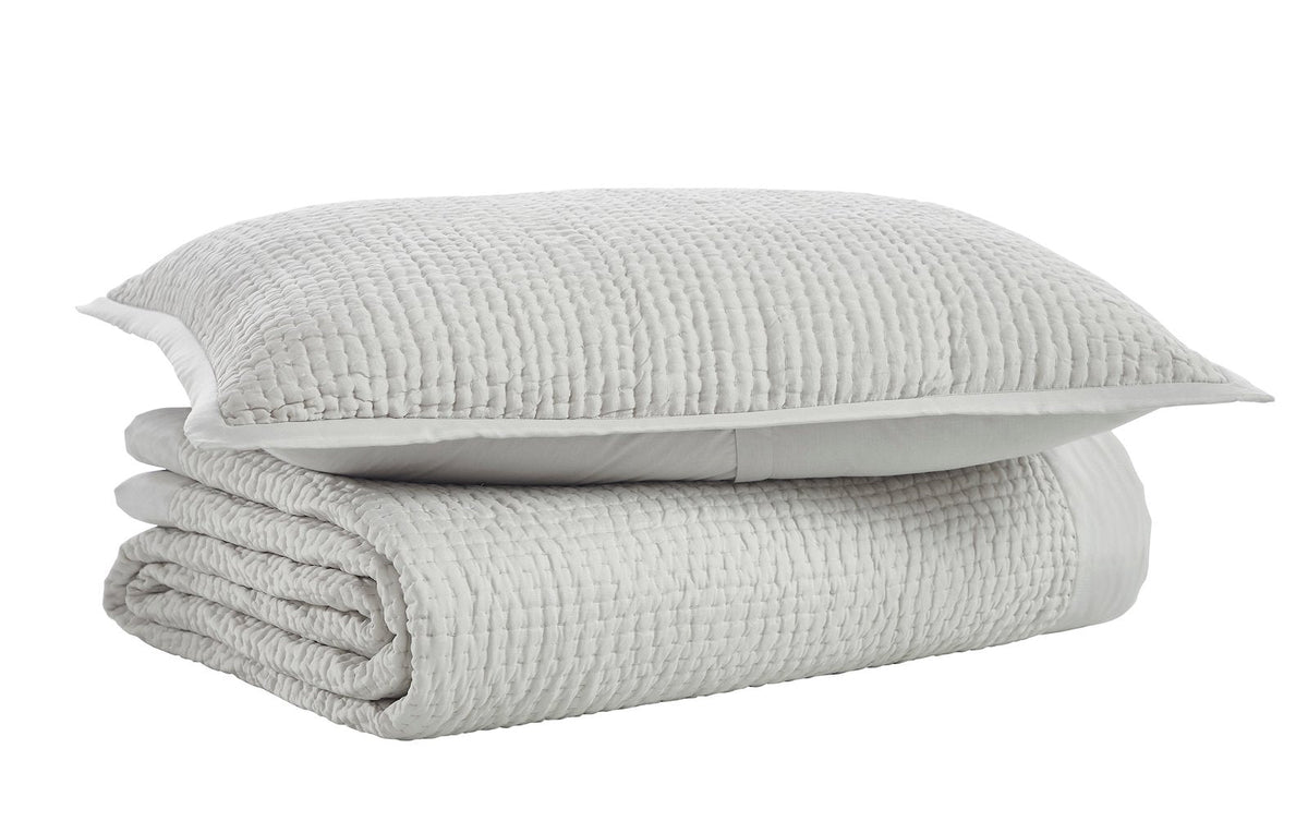 CL-197-9496_6|Folded light grey coverlet featuring a subtle waffle-knit texture, offering a cozy and stylish addition to modern bedroom decor.