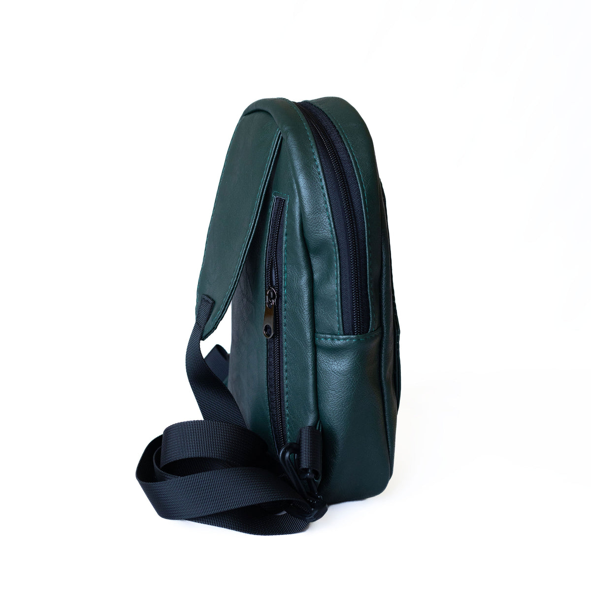 Buru forest green vegan leather sling bag lifestyle #color_forest-green