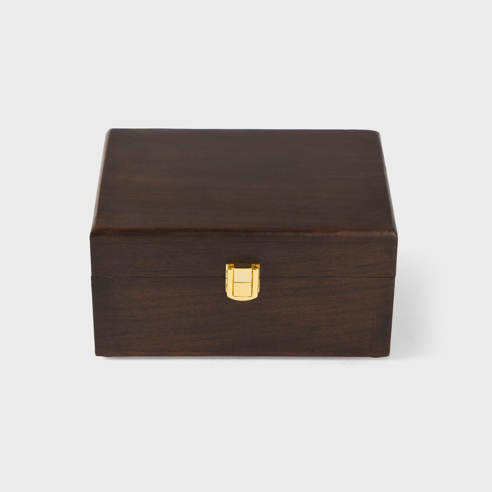 close-up of urban walnut finish and metal latch on acacia wood keepsake box
