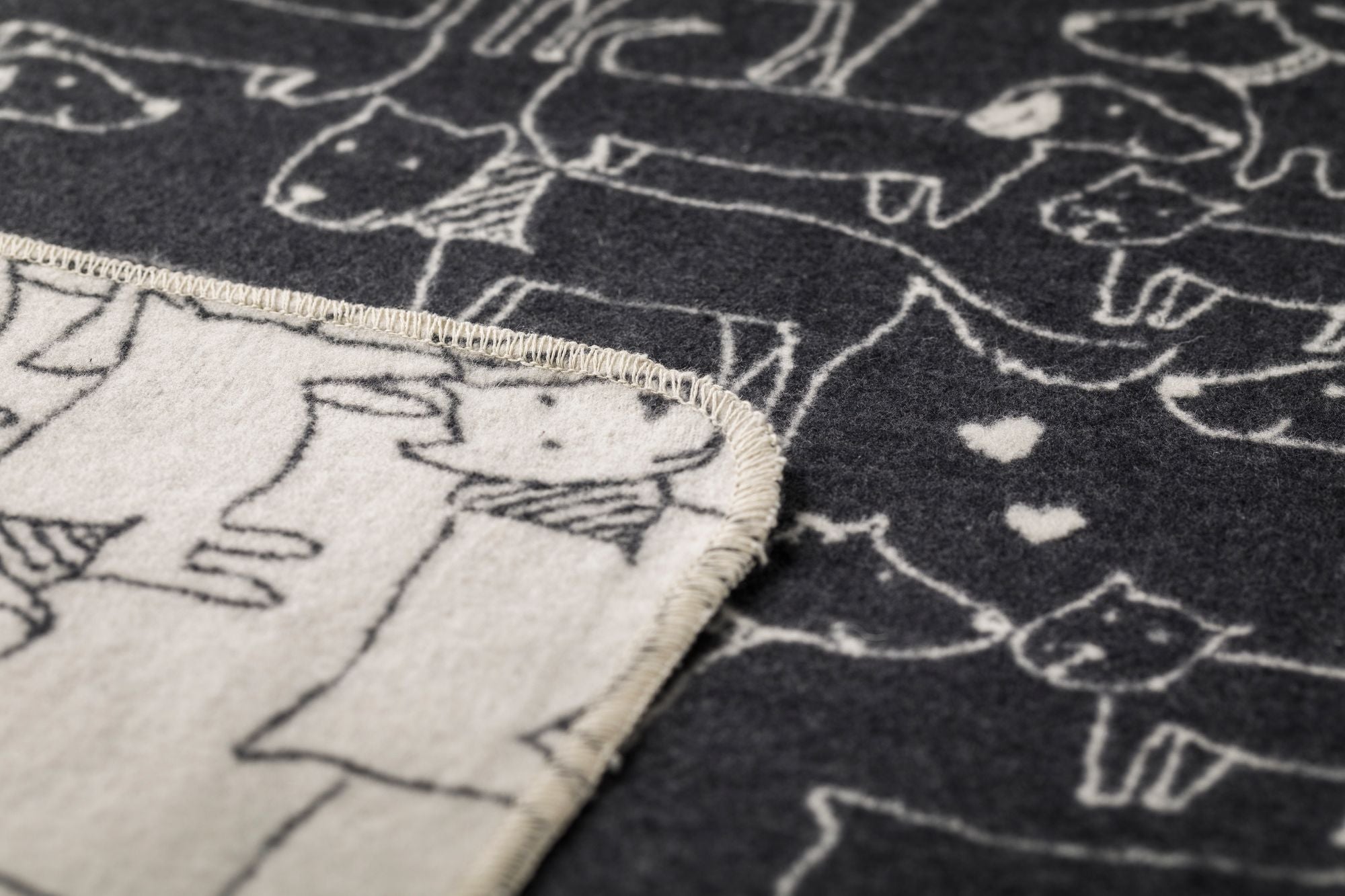 JUWEL throw "dogs allover" in . Blanket made by David Fussenegger , a family-run mill in Austria.