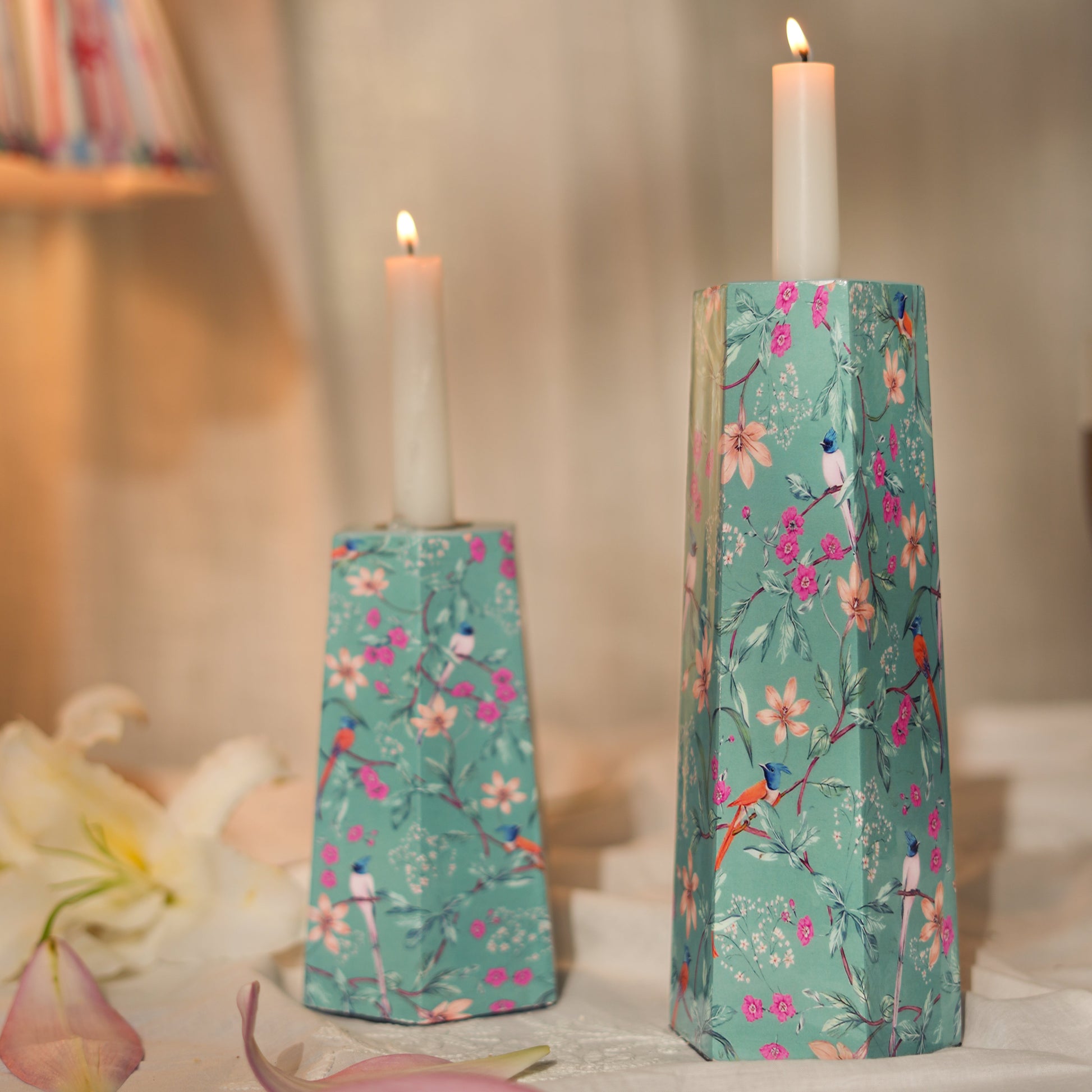 Modern aqua floral hexagonal candle stands in medium and large sizes.