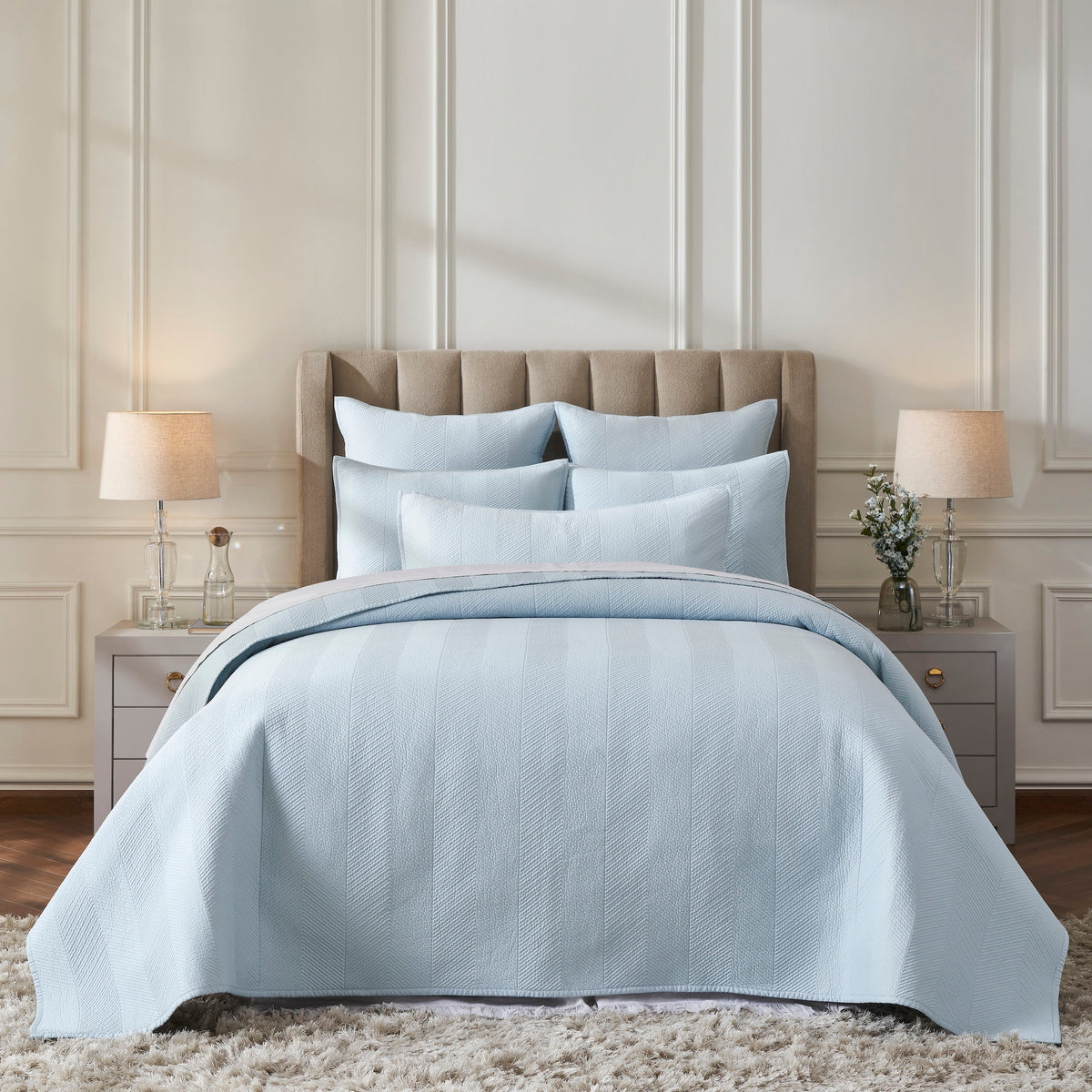 CL-262-9496_1|Elegant light blue quilted coverlet with subtle herringbone pattern on a full bed in a serene bedroom setting.