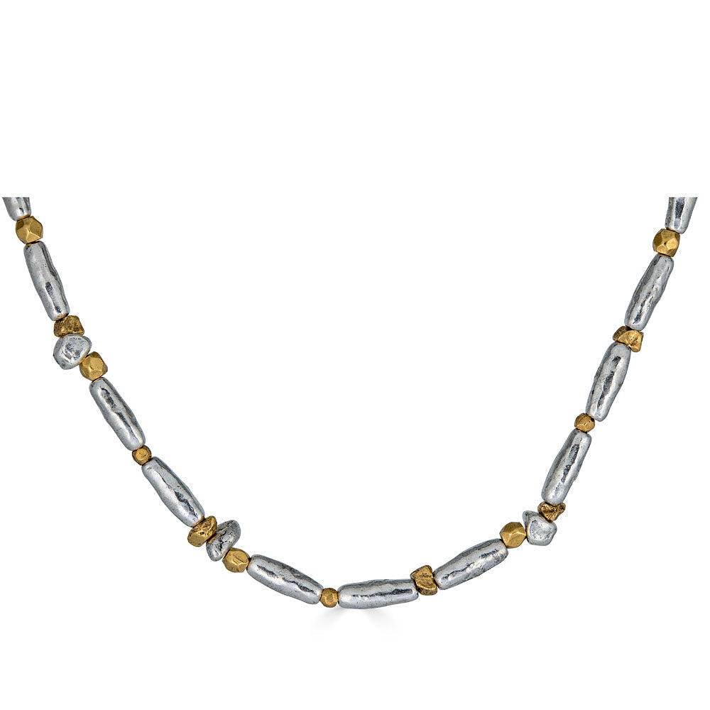 Mixed metal necklace with organic gold and silver-toned beads.