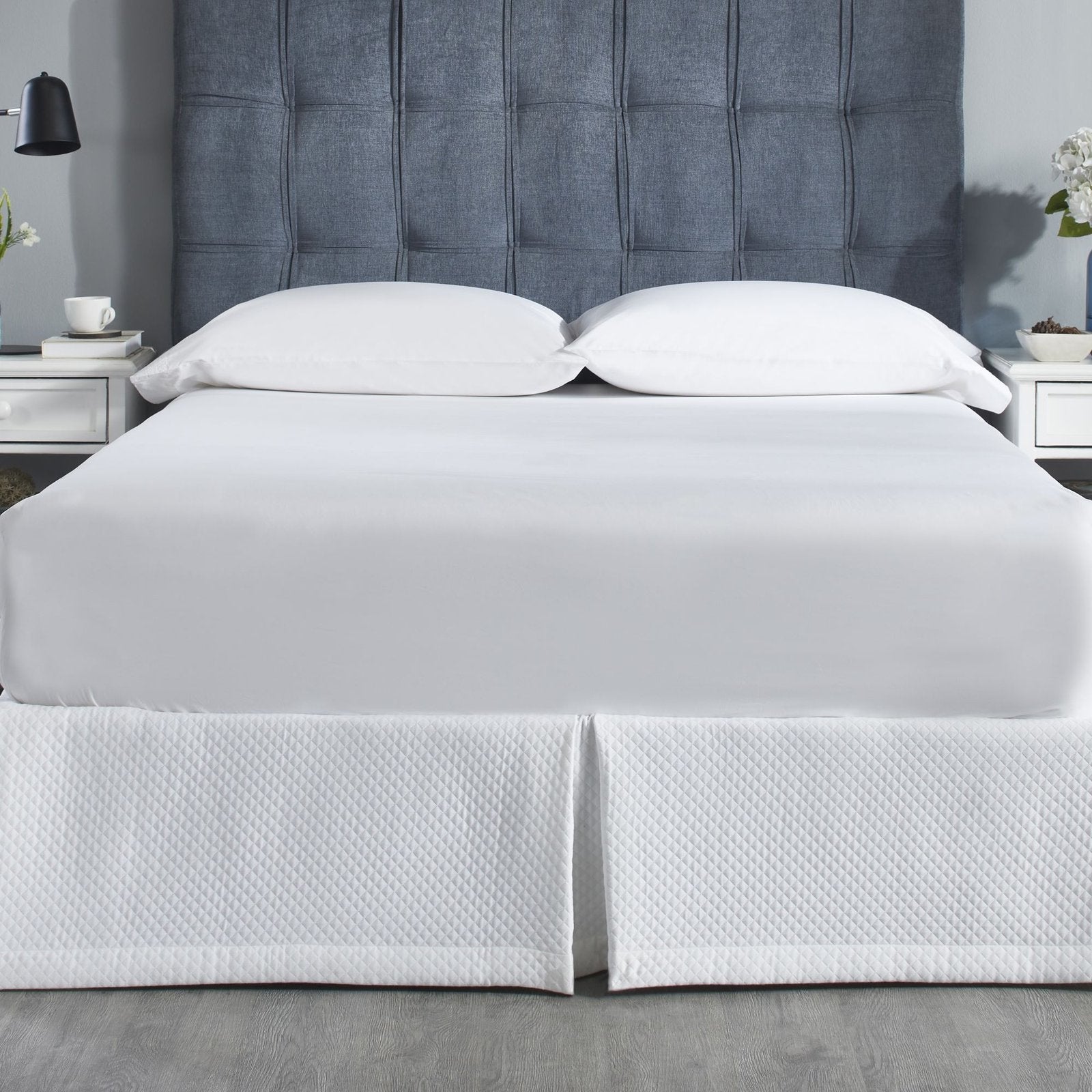 BS-117-7880_1|Pristine white quilted panel bed skirt with a refined diamond pattern, adding elegant texture to any modern bedroom aesthetic.