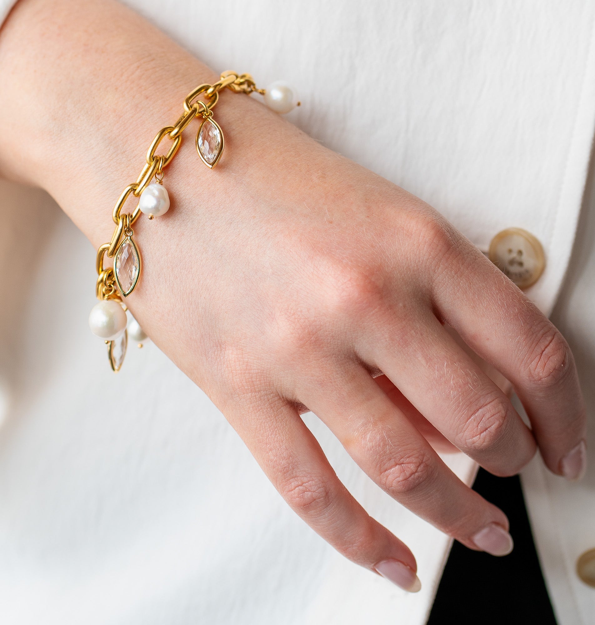 Gold chain bracelet with Edison pearl and marquise-cut crystal charms, alternating along a chunky link design