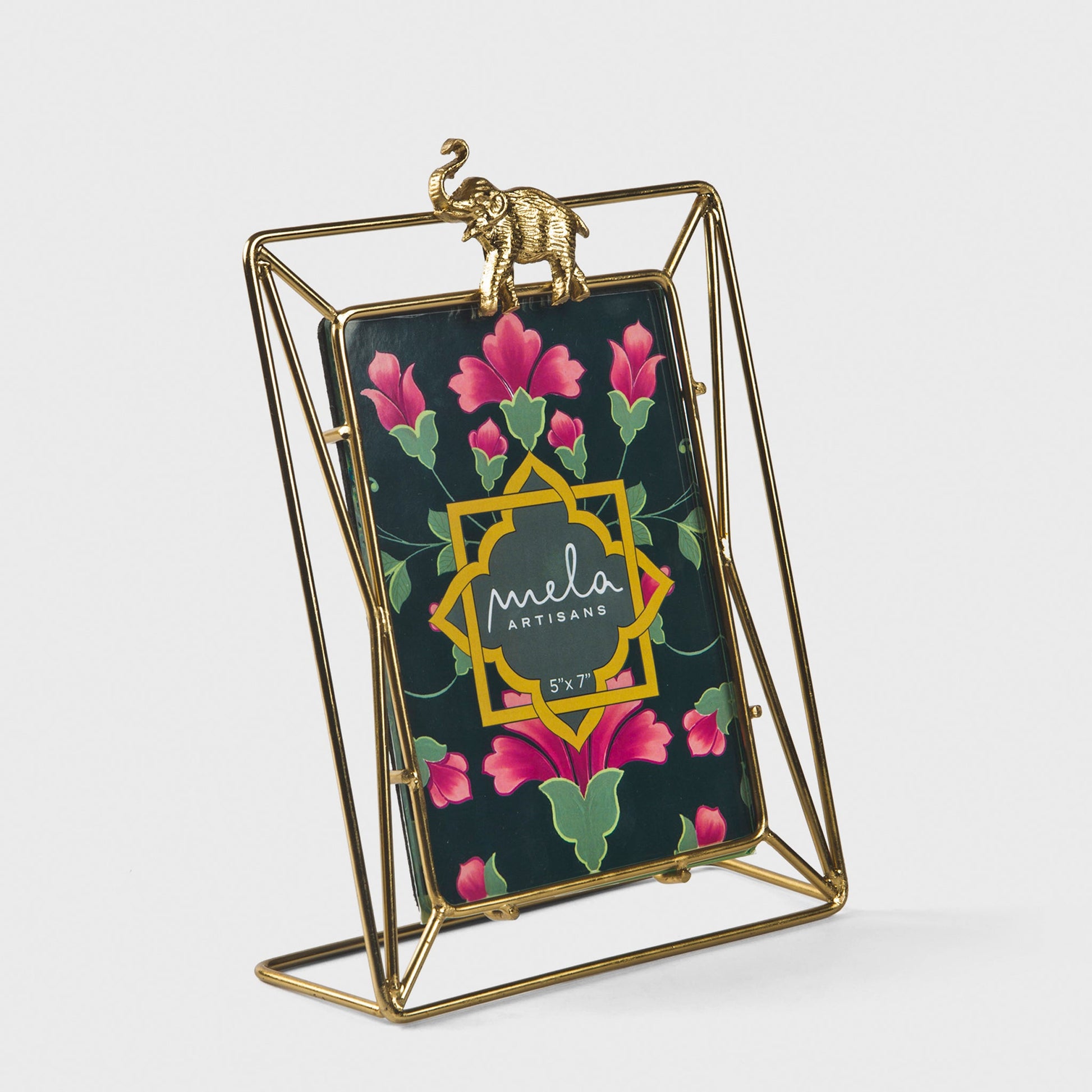 Handcrafted gold elephant motif picture frame for tabletop home decor.